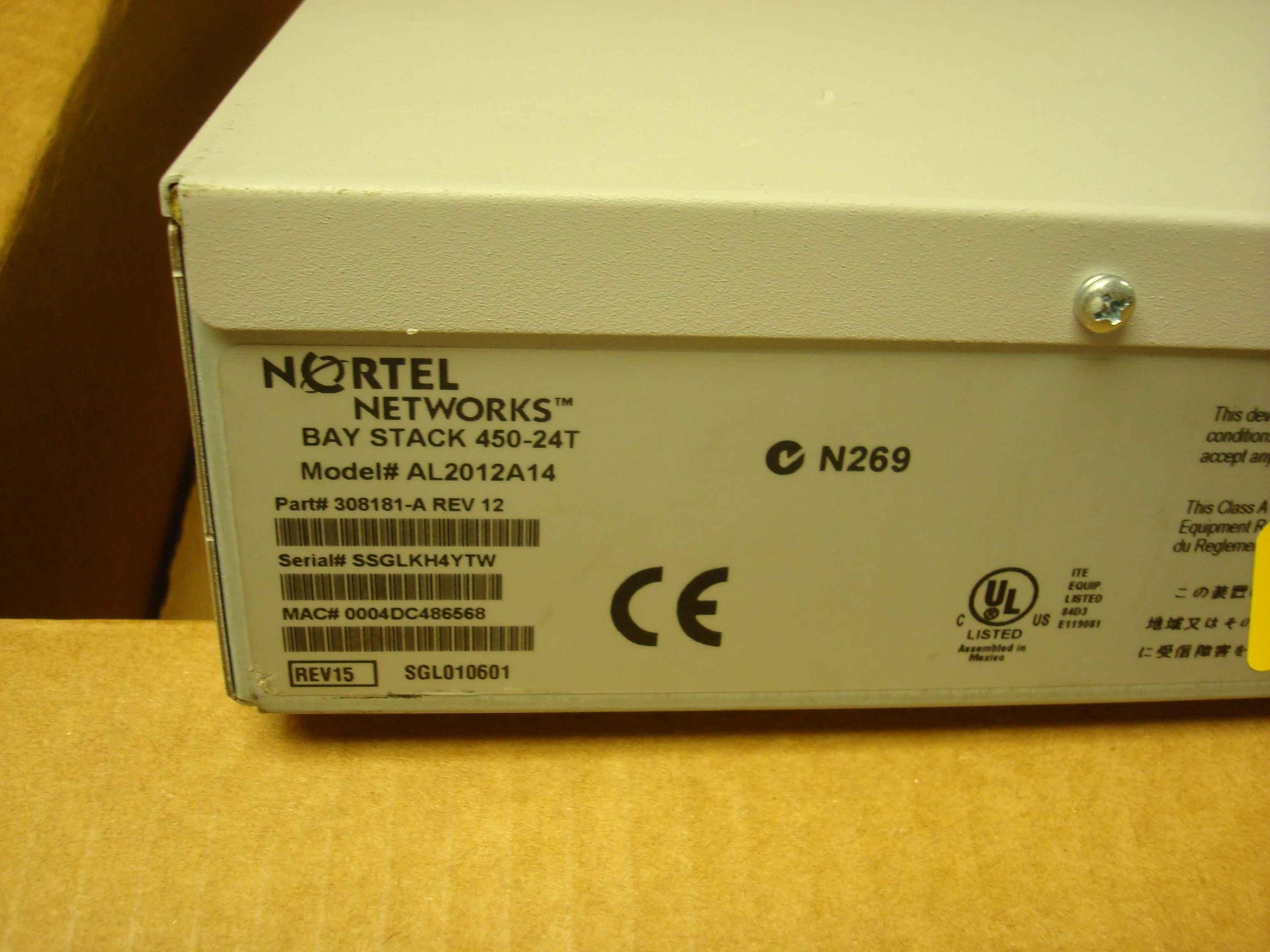 BAY NETWORKS / NORTEL 308181-A BAYSTACK 450-24T 10/100 24 PORT SWITCH AC POWER WITH 400-ST1 CASCADE MODULE