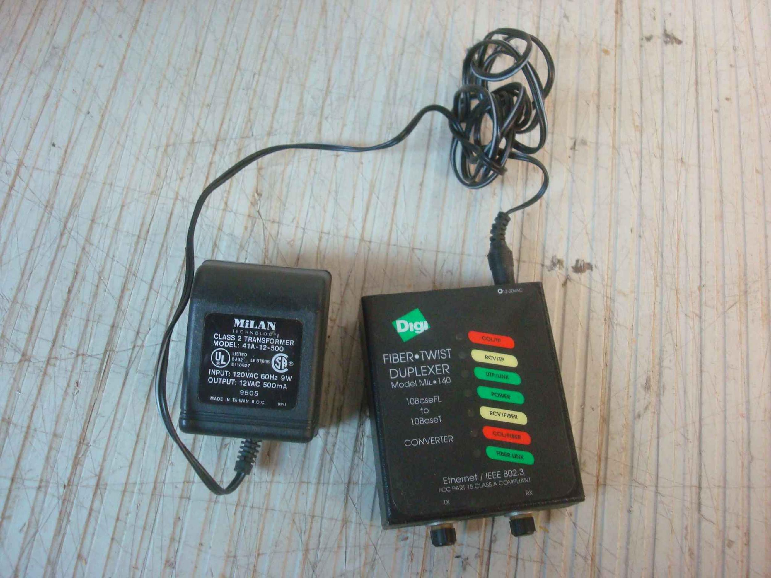 DIGI INTERNATIONAL MIL-140 10 BASE FL TO 10 BASE T FIBER TO ETHERNET CONVERTER 12VAC TRANSFORMER