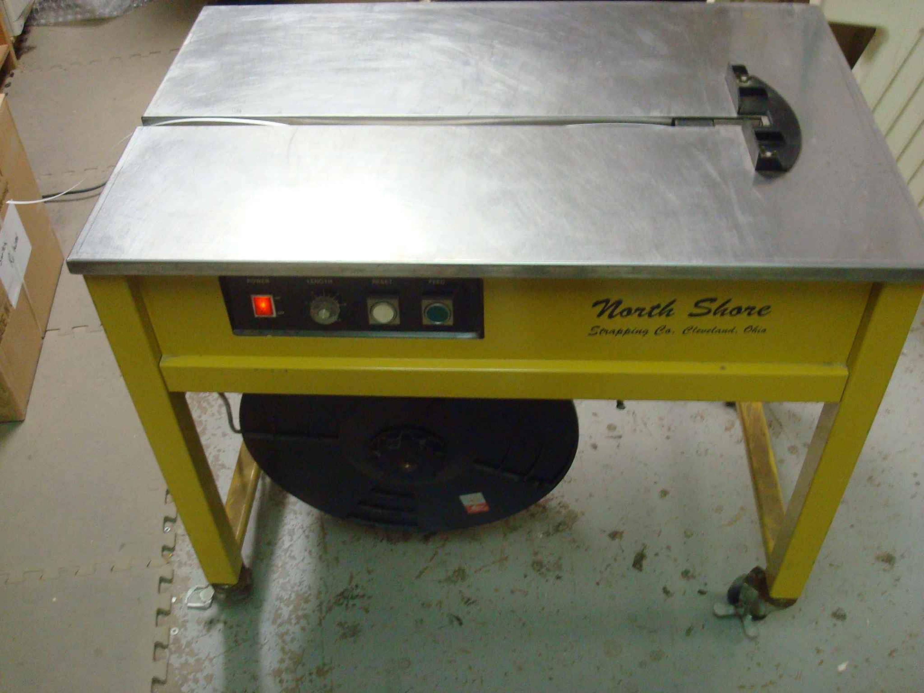 NORTH SHORE STRAPPING CO PSIN3505-A PLASTIC STRAPPING MACHINE