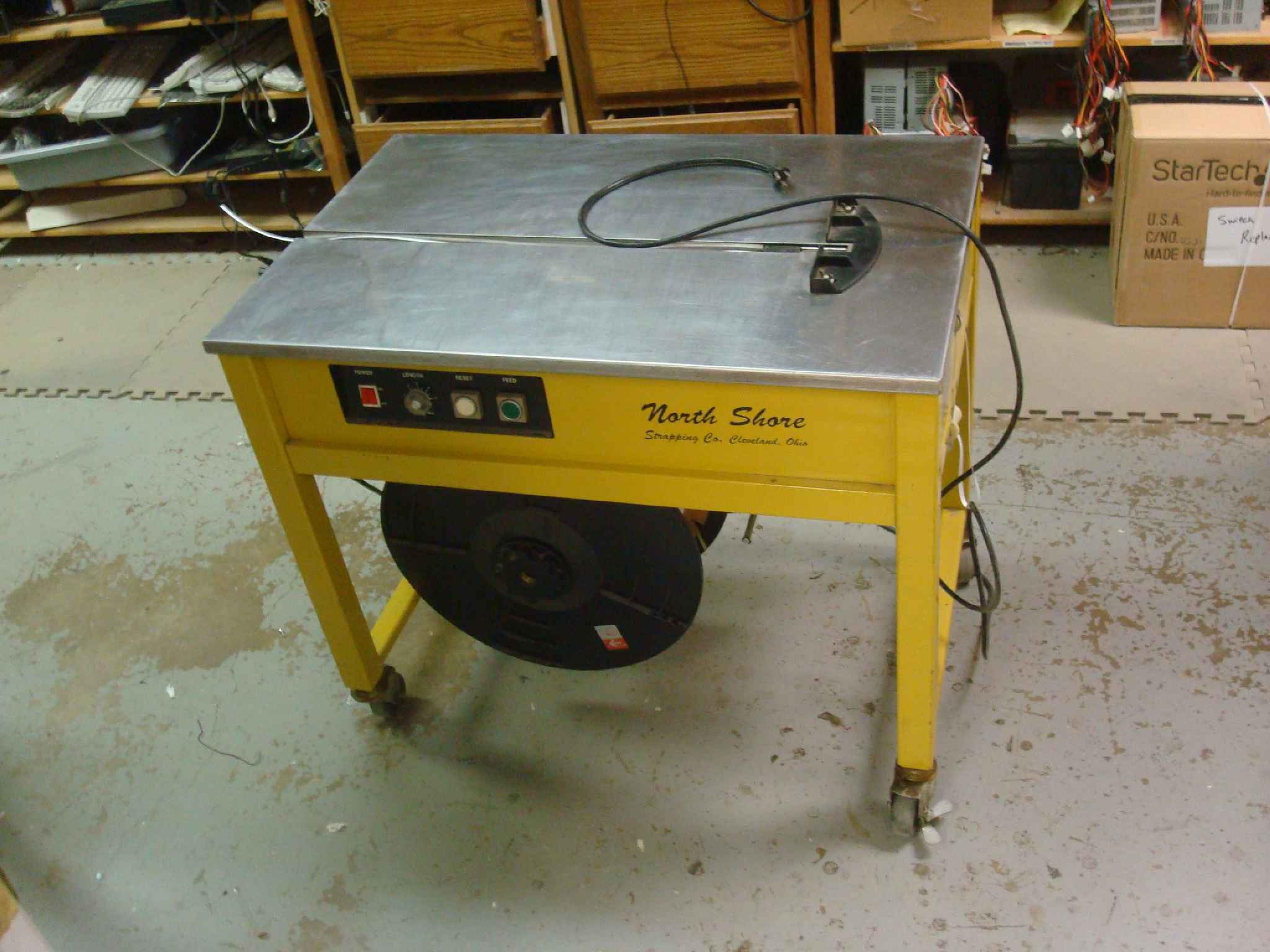 NORTH SHORE STRAPPING CO PSIN3505-A PLASTIC STRAPPING MACHINE