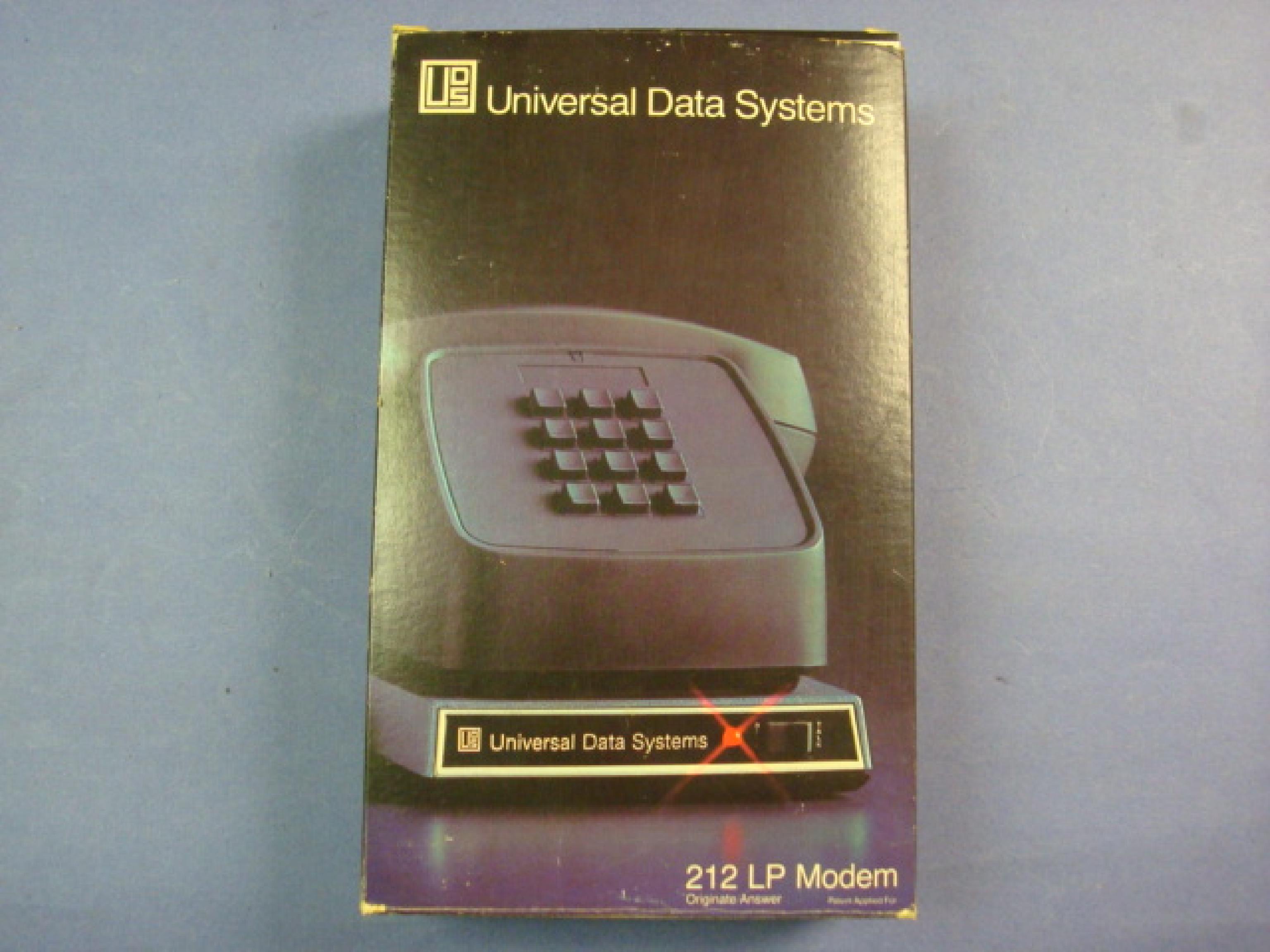 UNIVERSAL DATA SYSTEMS 212 LP DEFECTIVE, WITH BOX + DOCS 1200 BAUD EXTERNAL MODEM