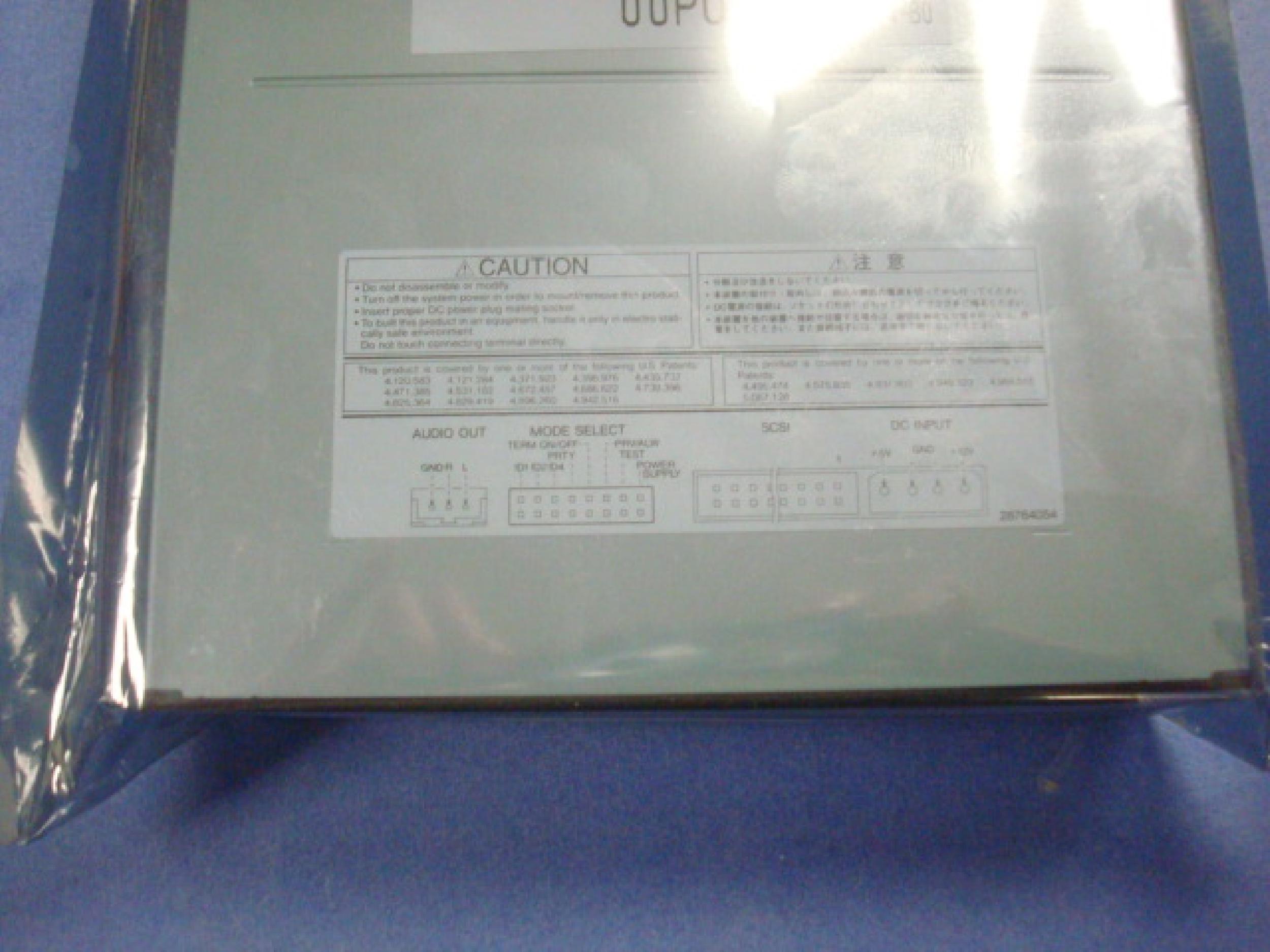 COMPAQ / HEWLETT PACKARD / HP 306259-001 12X SCSI CDROM DRIVE BEIGE BEZEL INTERNAL