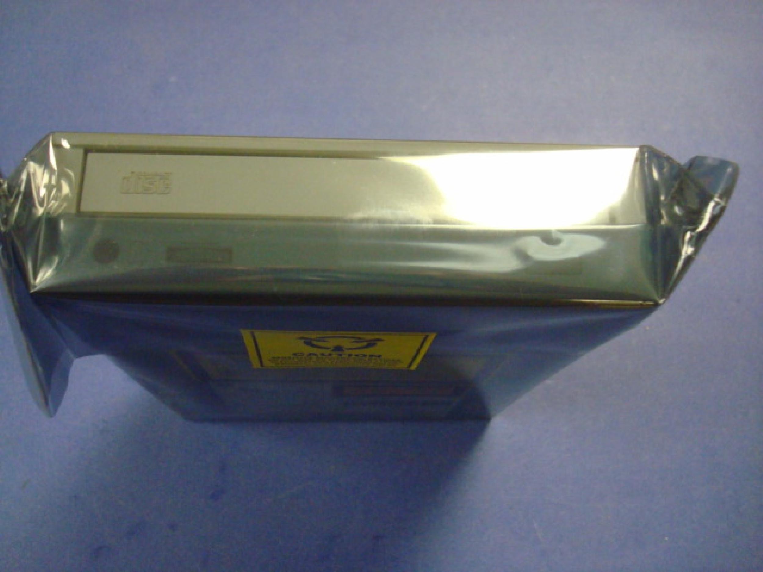 COMPAQ / HEWLETT PACKARD / HP 306259-001 12X SCSI CDROM DRIVE BEIGE BEZEL INTERNAL