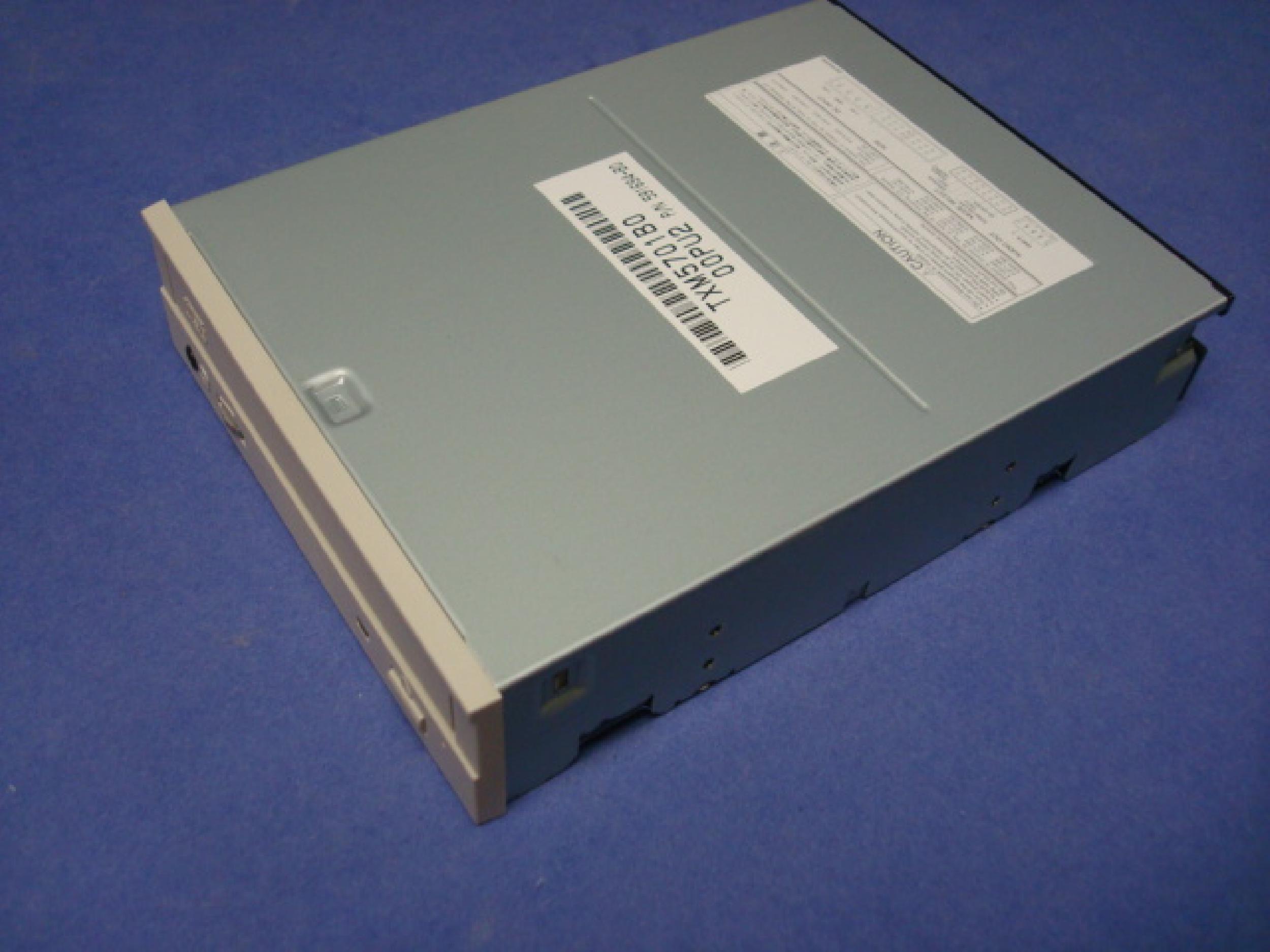 COMPAQ / HEWLETT PACKARD / HP 306259-001 12X SCSI CDROM DRIVE BEIGE BEZEL INTERNAL