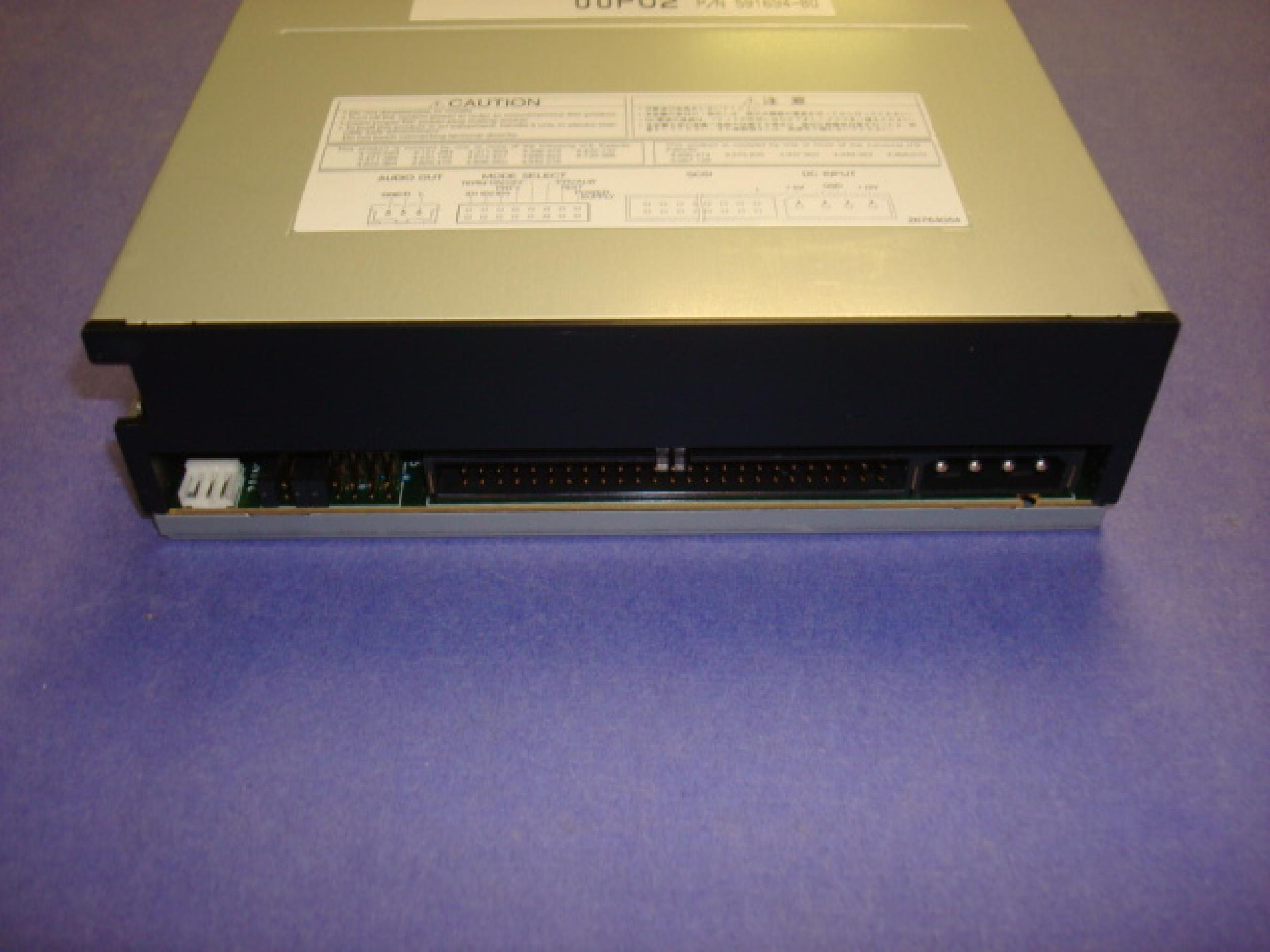 COMPAQ / HEWLETT PACKARD / HP 306259-001 12X SCSI CDROM DRIVE BEIGE BEZEL INTERNAL