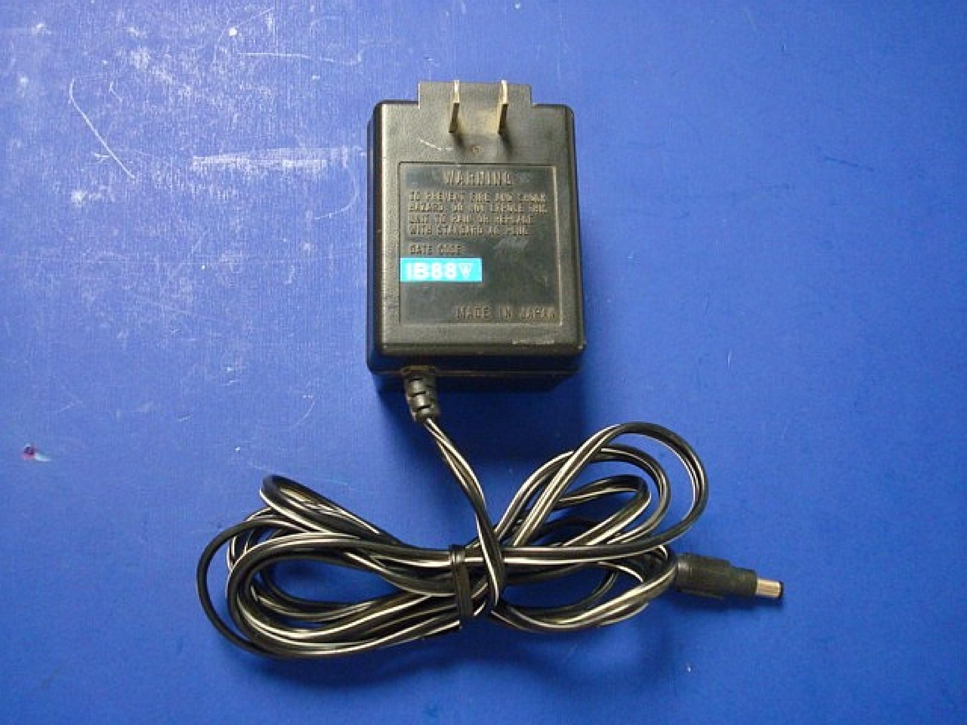 TANDY 25-3500 AC ADAPTER 15V DC 700MA 20W