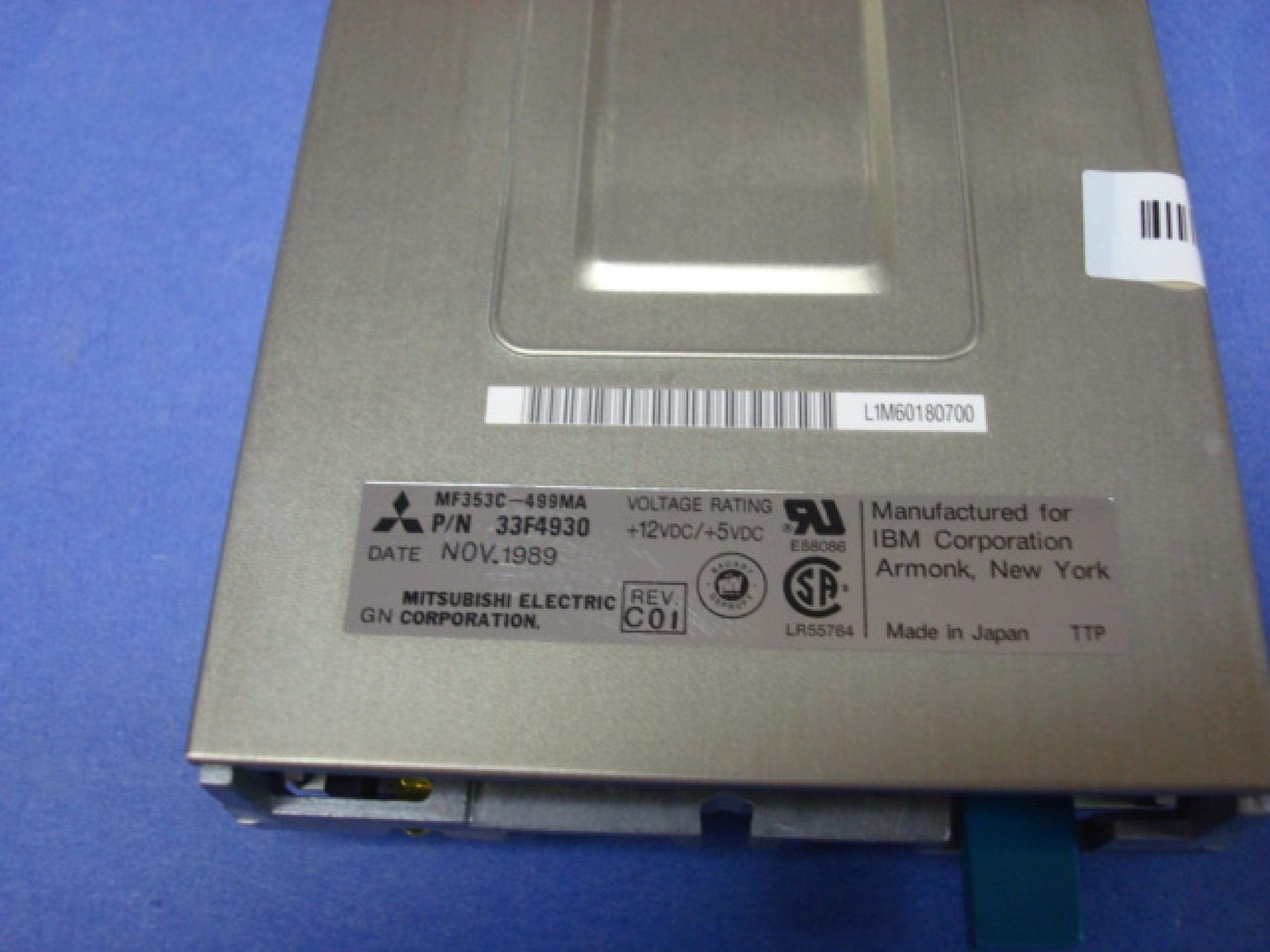 IBM 33F4930 YEAR 1989,720K 34PIN FLOPPY DRIVE SMALL BUTTON FOR MODEL 8555
