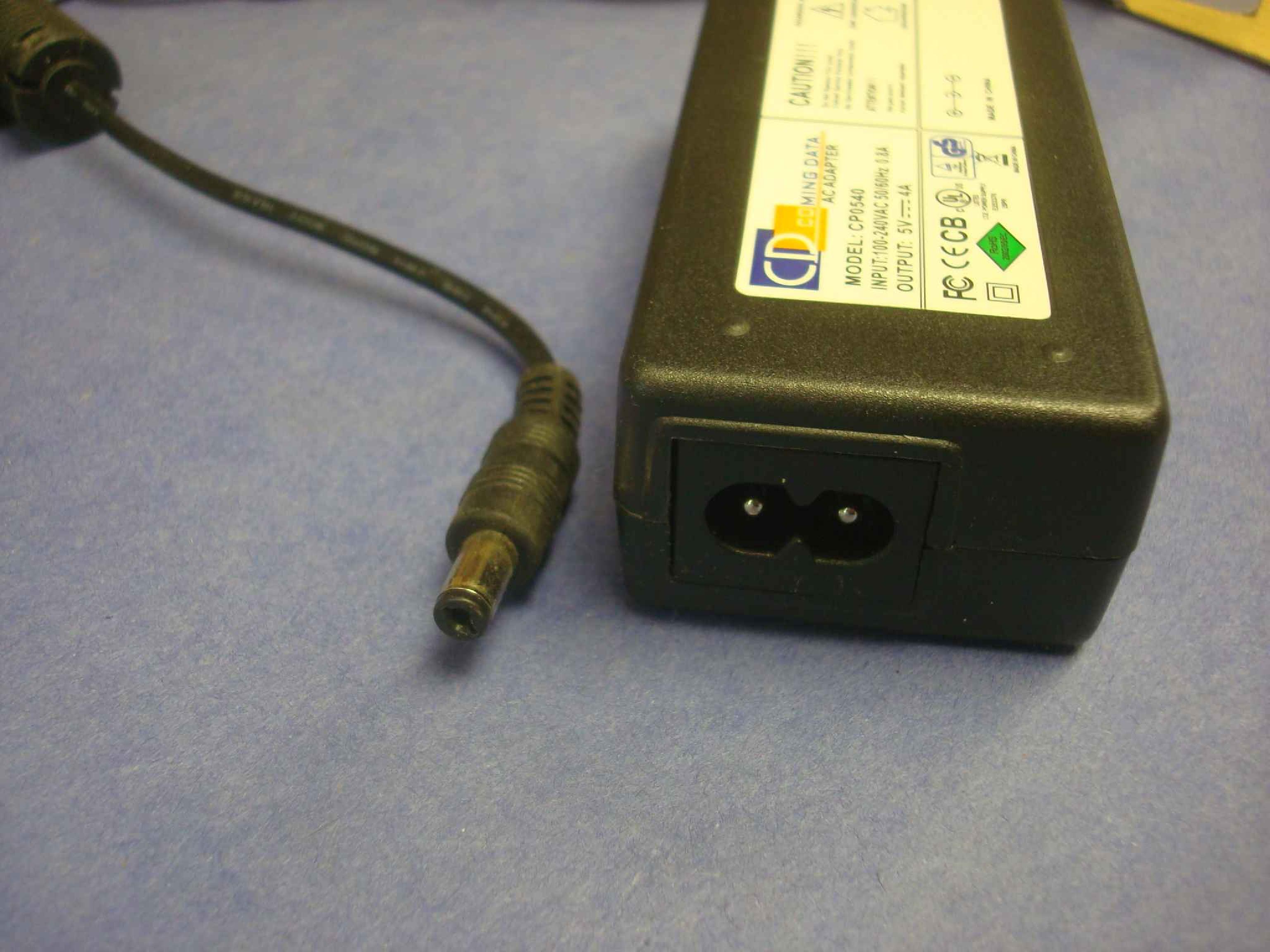 COMING DATA CP0540 AC ADAPTER 5VDC 4A OD:5.5MM ID:2.1MM DESKTOP, SPRING LOADED BARREL CONNECTOR, CENTER POSITIVE