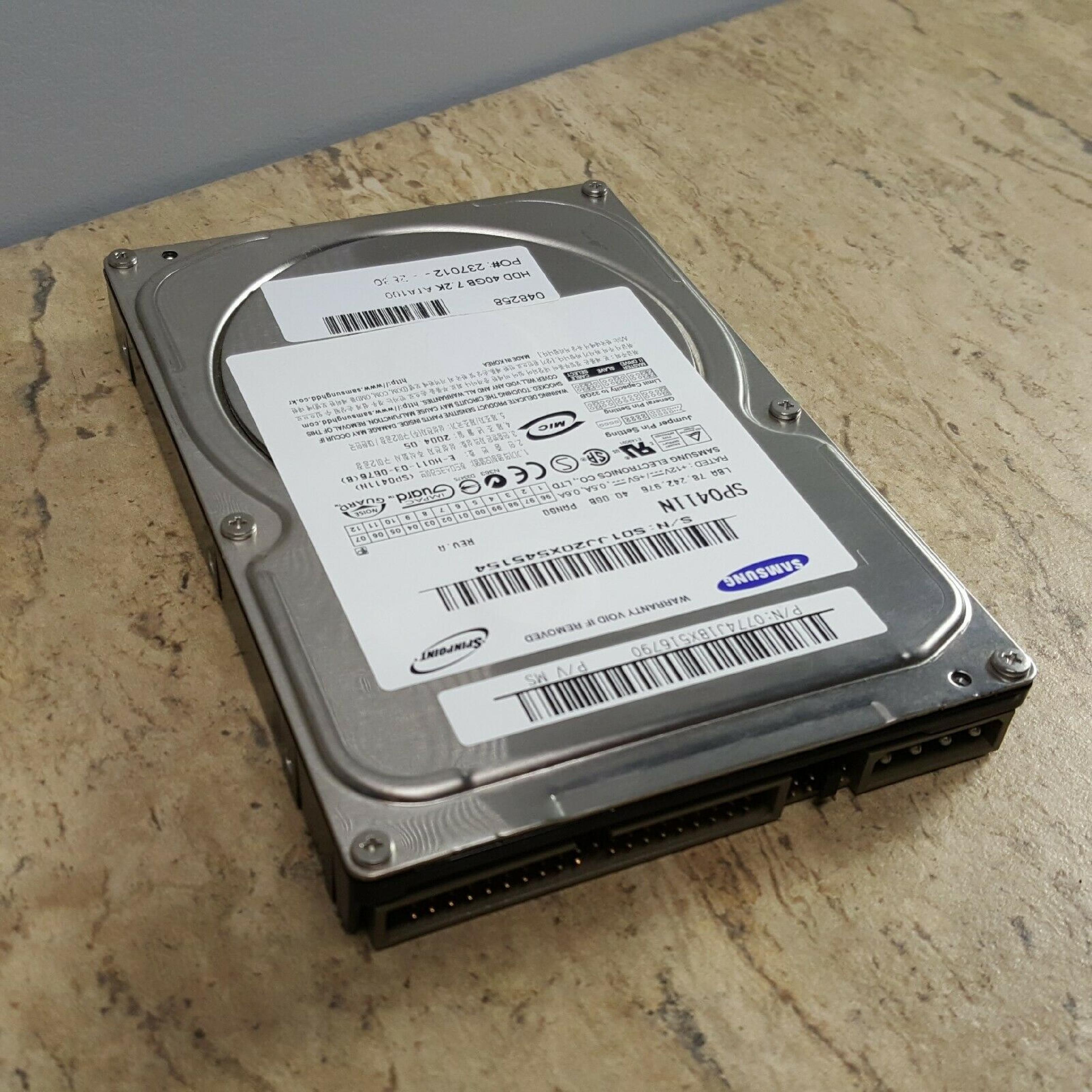 SAMSUNG / SEAGATE SP0411N 40GB 3.5 INCH 7200 RPM IDE HARD DRIVE P/V SSN SLIM HD DATE: 2004.04 LBA: 78,165,360 REV: A F/W: 100-11 PANGO 2004.06 2004.09 2004.10 2004.11 2004.02 2005.03 2004.05 REV F/W DATE 2004.03