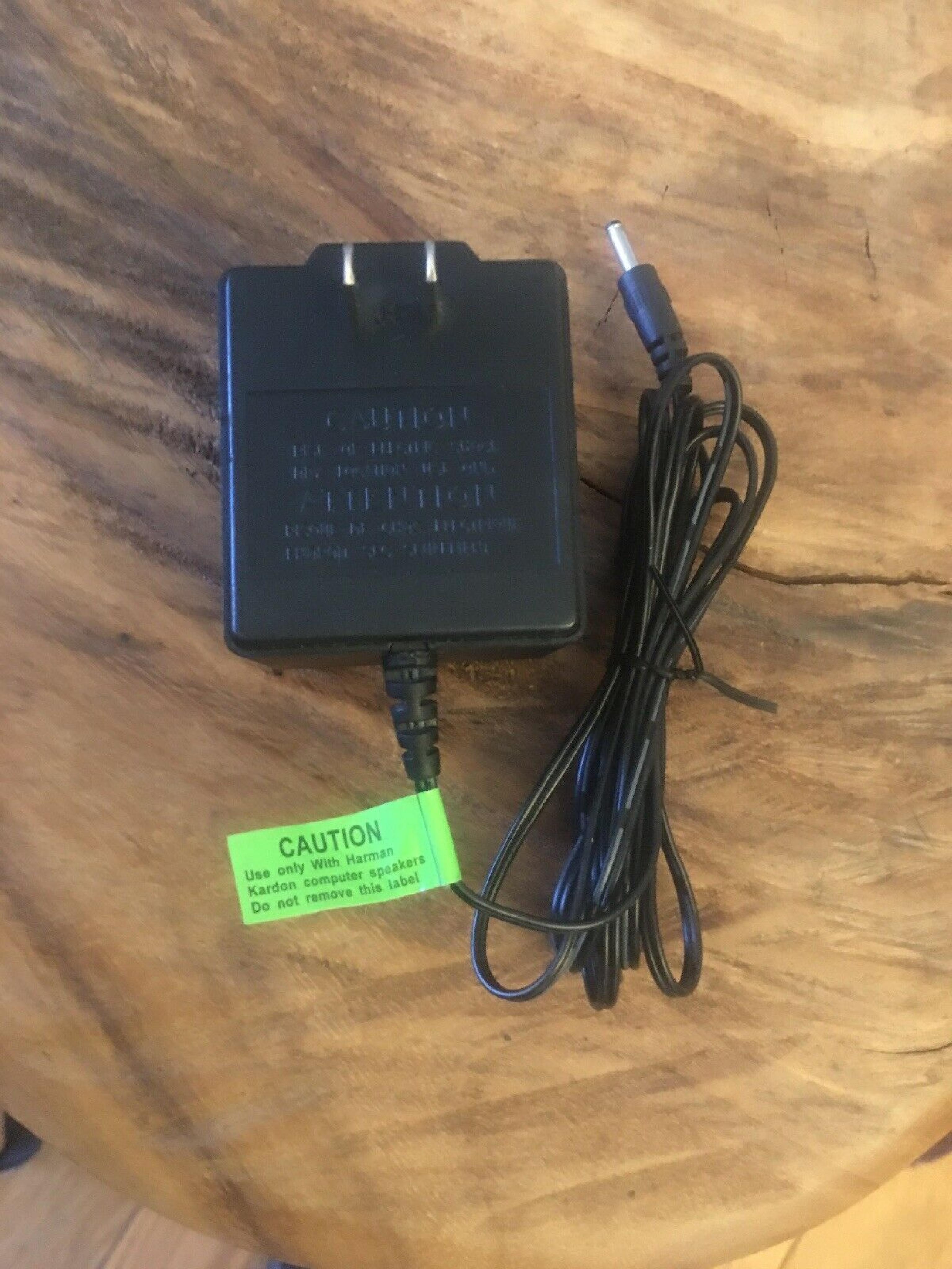 HARMAN KARDON A4815110T AC ADAPTER 15VAC 1.1A OD:5.5MM ID:2MM BARREL CONNECTOR 6FOOT CABLE OUTSIDE POLE:NEGATIVE FOR 06941V