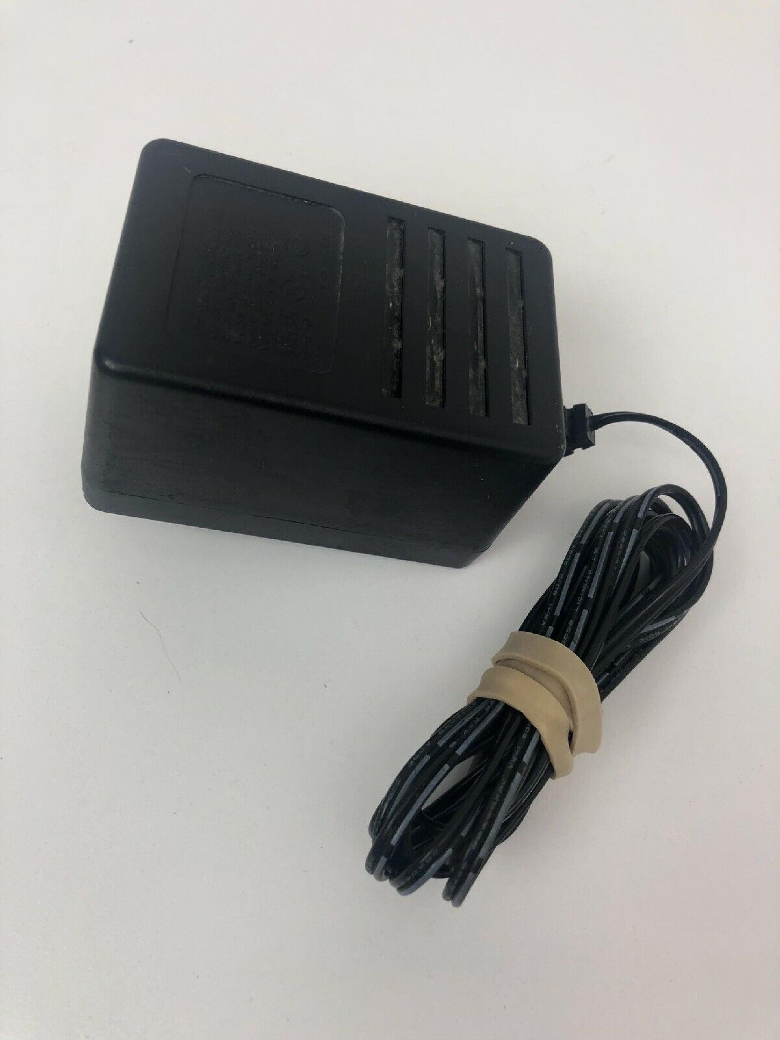 LEADER ELECTRONICS / HON KWANG SAM01T AC ADAPTER 12VDC 1A OD:5.5MM ID:2MM BARREL CONNECTOR 6FOOT CABLE OUTSIDE POLE:NEGATIVE FOR 04N567 12V DC 1000MA ID:2.6MM POSITIVE CENTER POLE