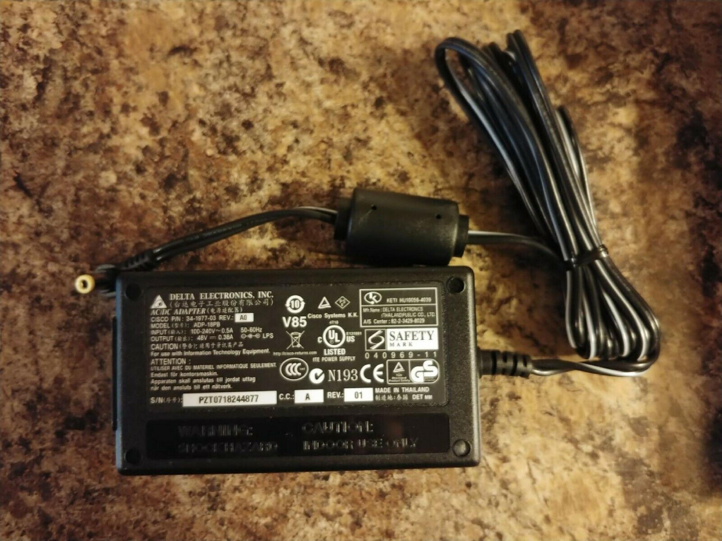 DELTA ELECTRONICS INC ADP-18PB AC ADAPTER 48V DC 0.38A WITH BARREL CONNECTOR CENTER POSITIVE OD:5.5MM ID:2.5MM