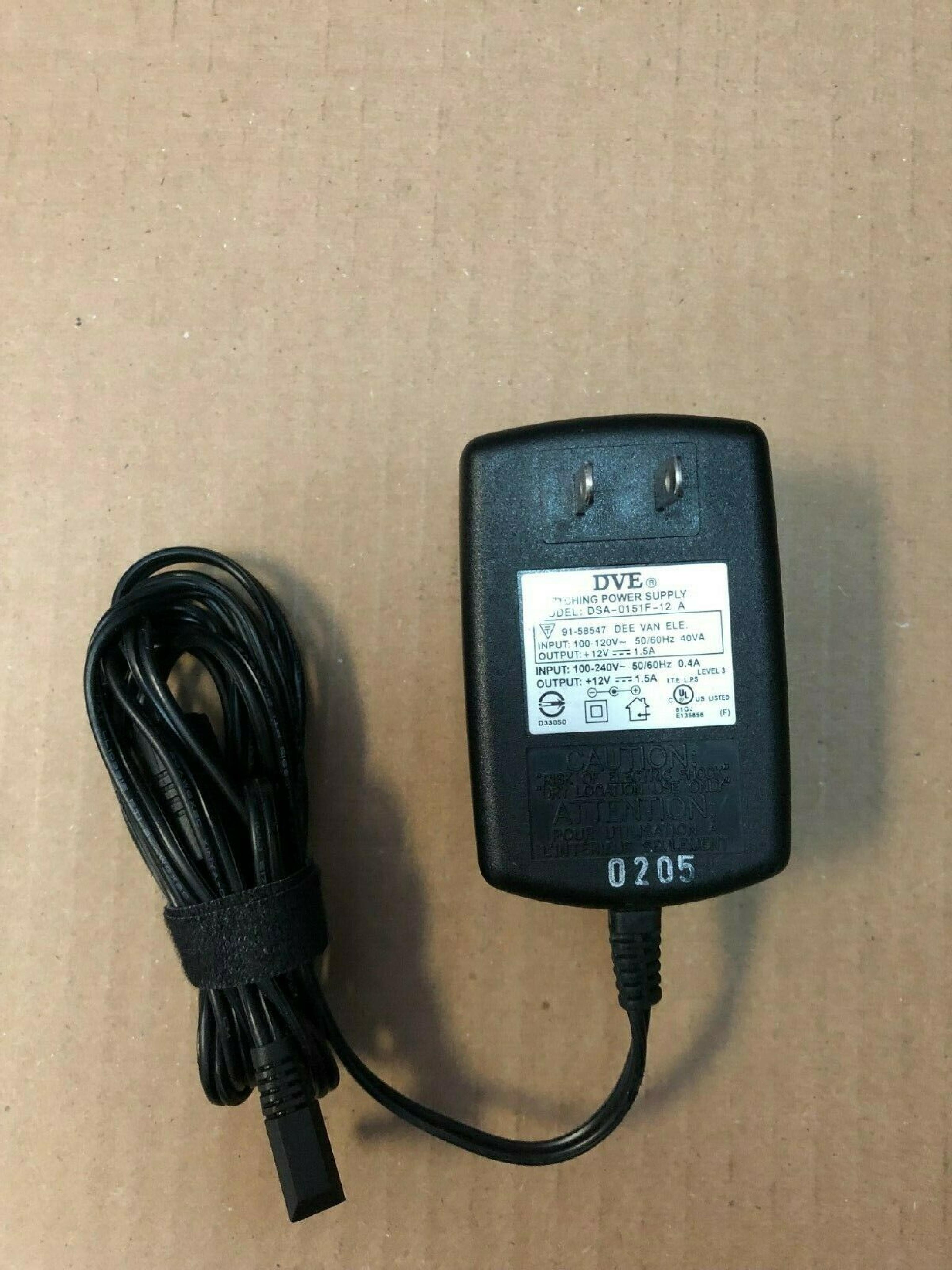 DVE DSA-0151F-12 CUT WIRE 12V DC 1.5A AC ADAPTER WITH BARREL CONNECTOR .4A OD:5.4MM ID:2.3MM NEGATIVE OUTSIDE POLE FOR USE WT1200LE