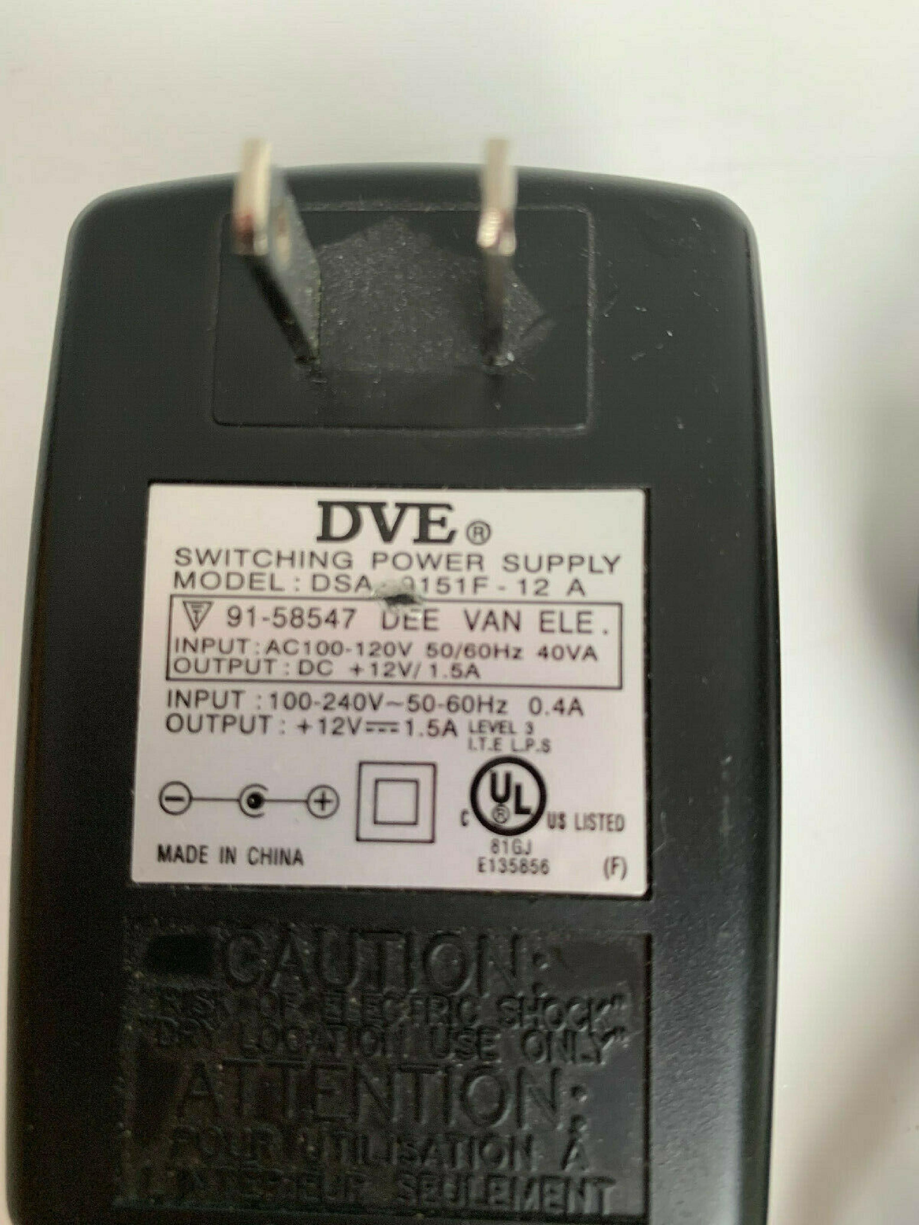 DVE DSA-0151F-12 CUT WIRE 12V DC 1.5A AC ADAPTER WITH BARREL CONNECTOR .4A OD:5.4MM ID:2.3MM NEGATIVE OUTSIDE POLE FOR USE WT1200LE