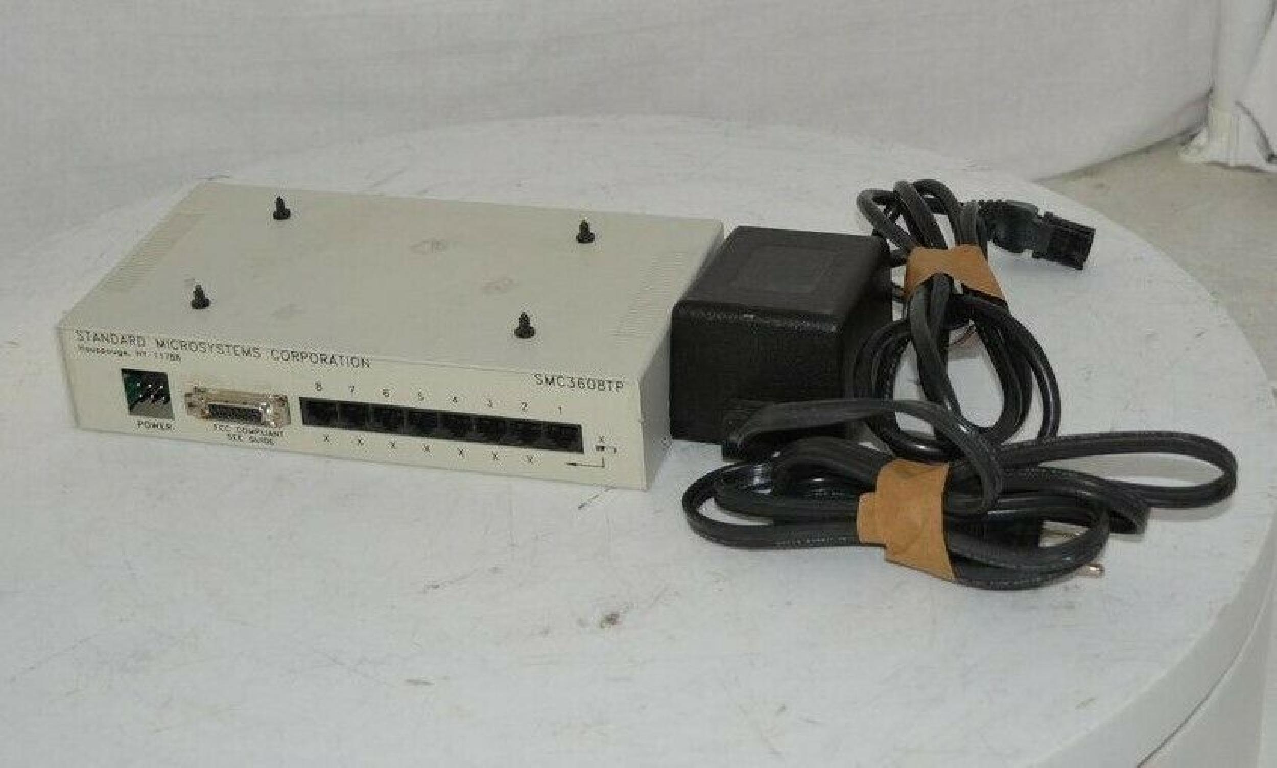 SMC / STANDARD MICROSYSTEMS CORPORATION 720.203 10BT CONCENTRATOR HUB 8 RJ45 1 AUI WITH SUPPLY