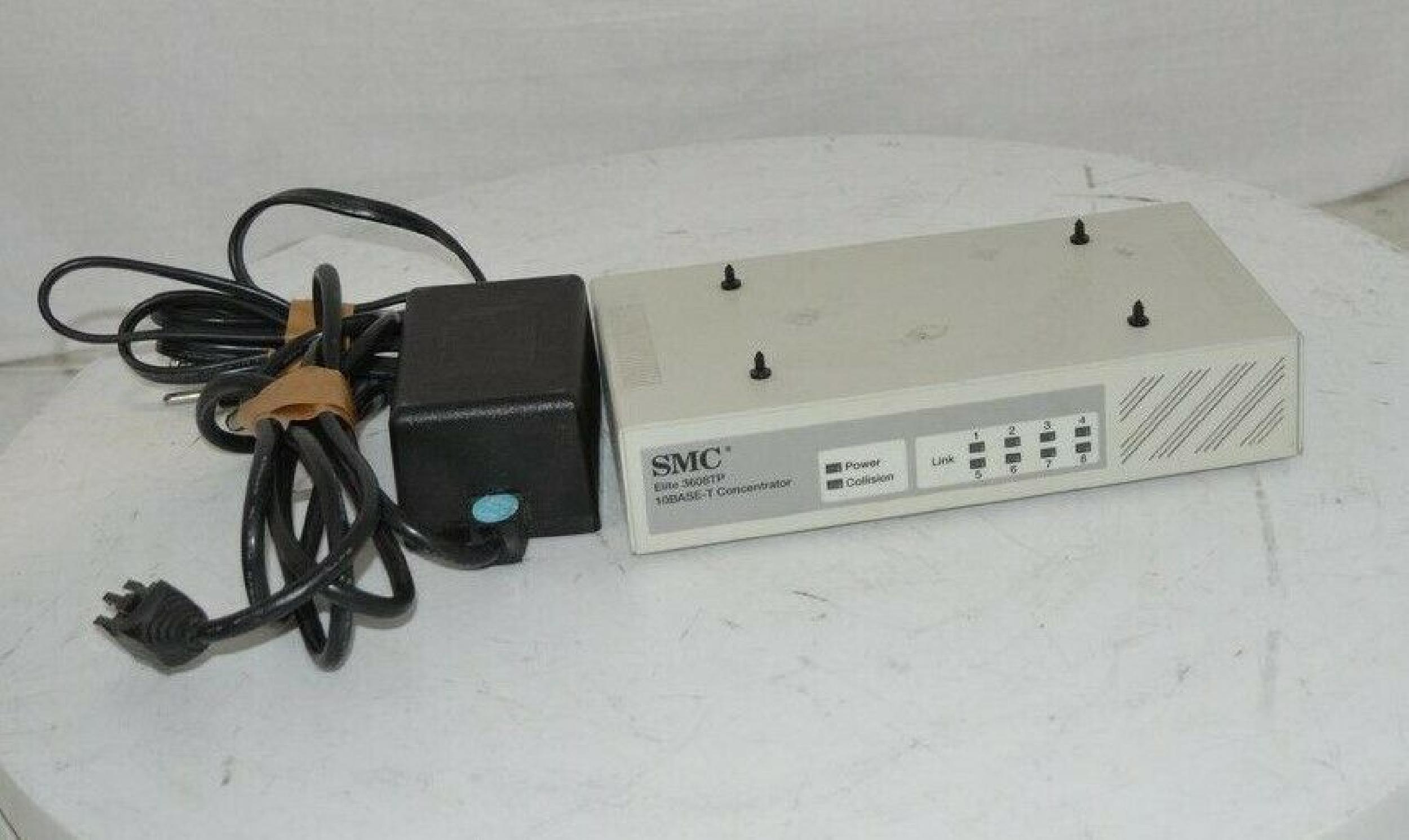 SMC / STANDARD MICROSYSTEMS CORPORATION 720.203 10BT CONCENTRATOR HUB 8 RJ45 1 AUI WITH SUPPLY