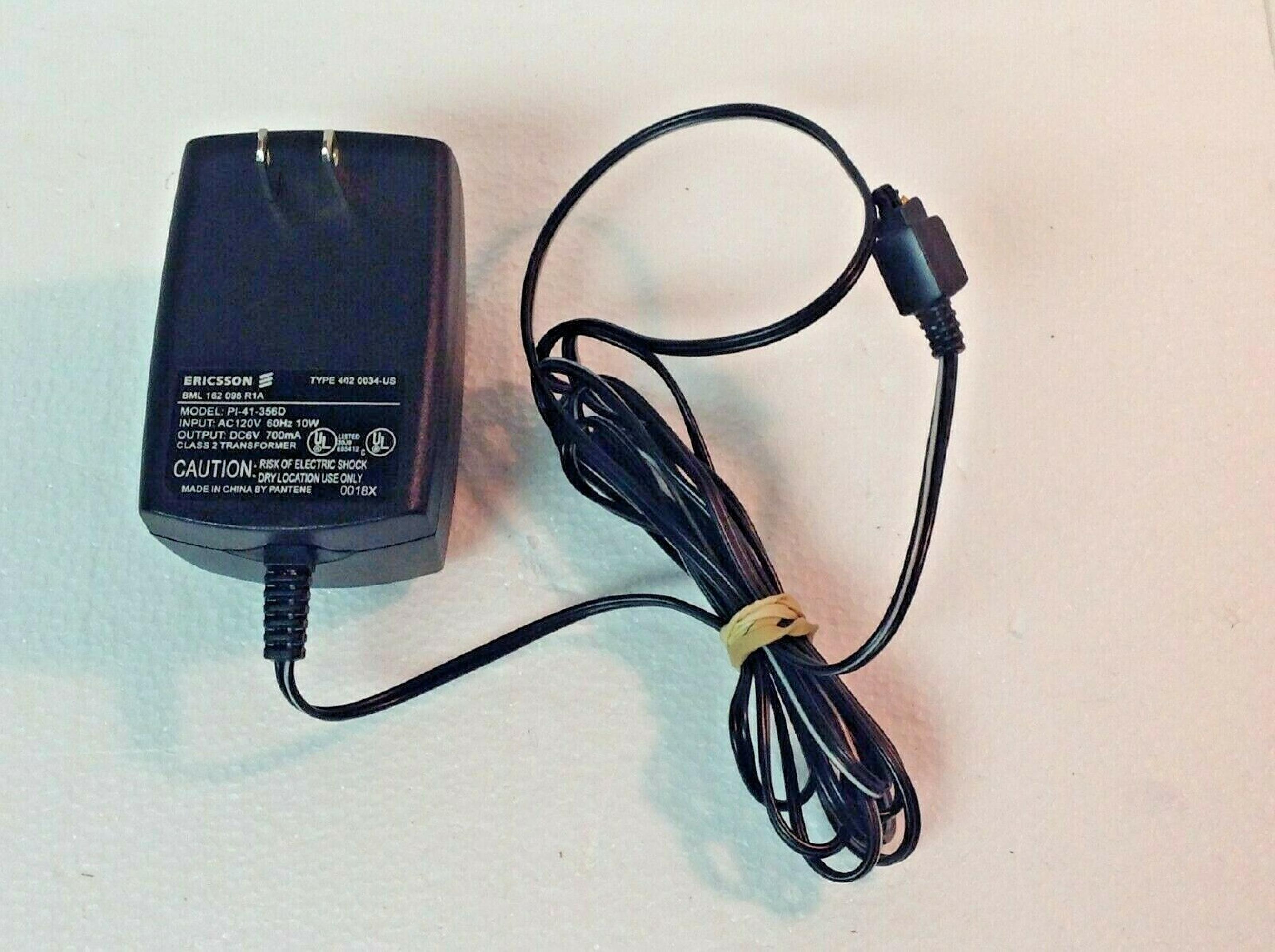 ERICSSON PI-41-356D AC ADAPTER 6V DC 700MA FOR USE WITH KH668