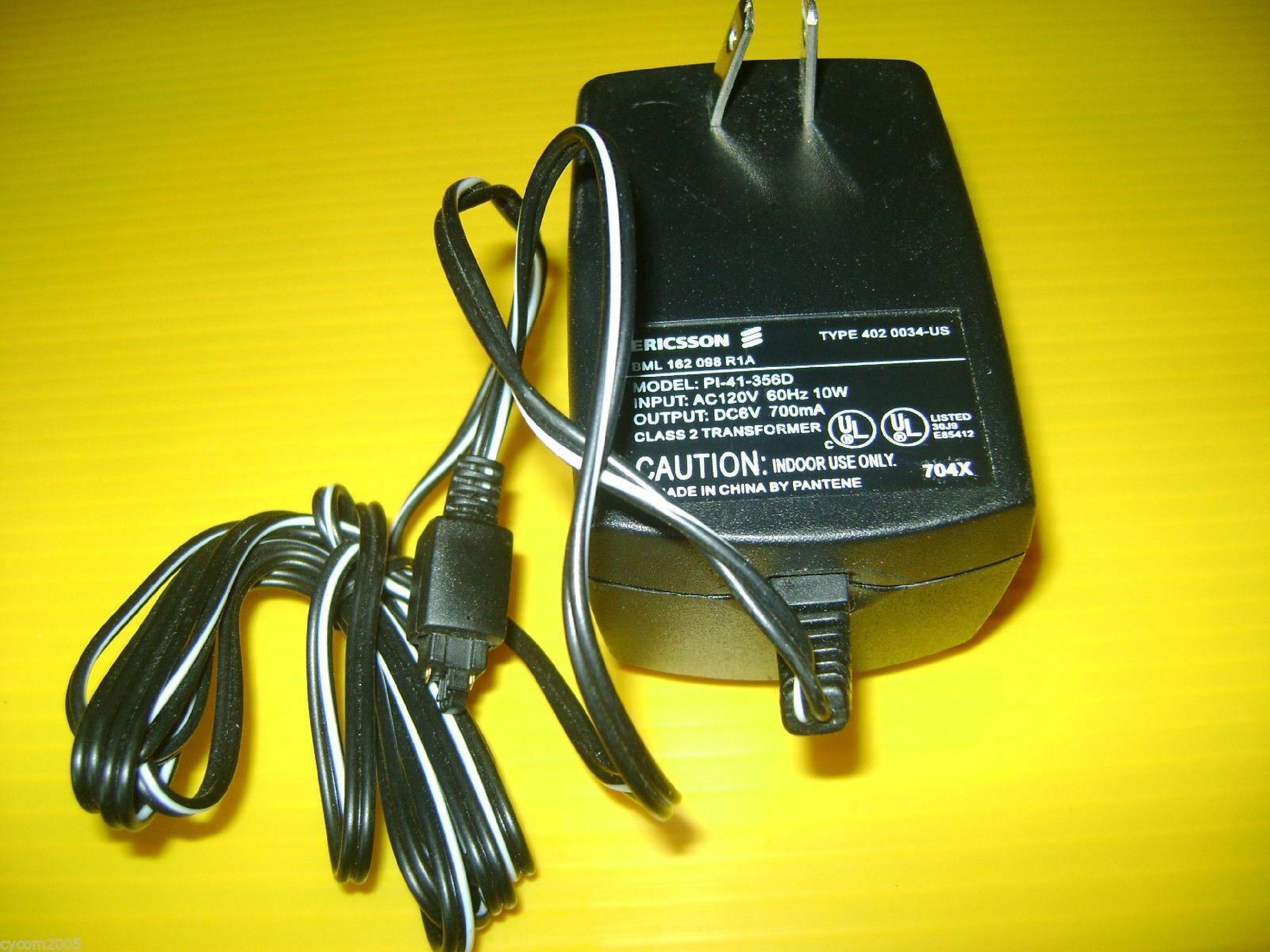 ERICSSON PI-41-356D AC ADAPTER 6V DC 700MA FOR USE WITH KH668