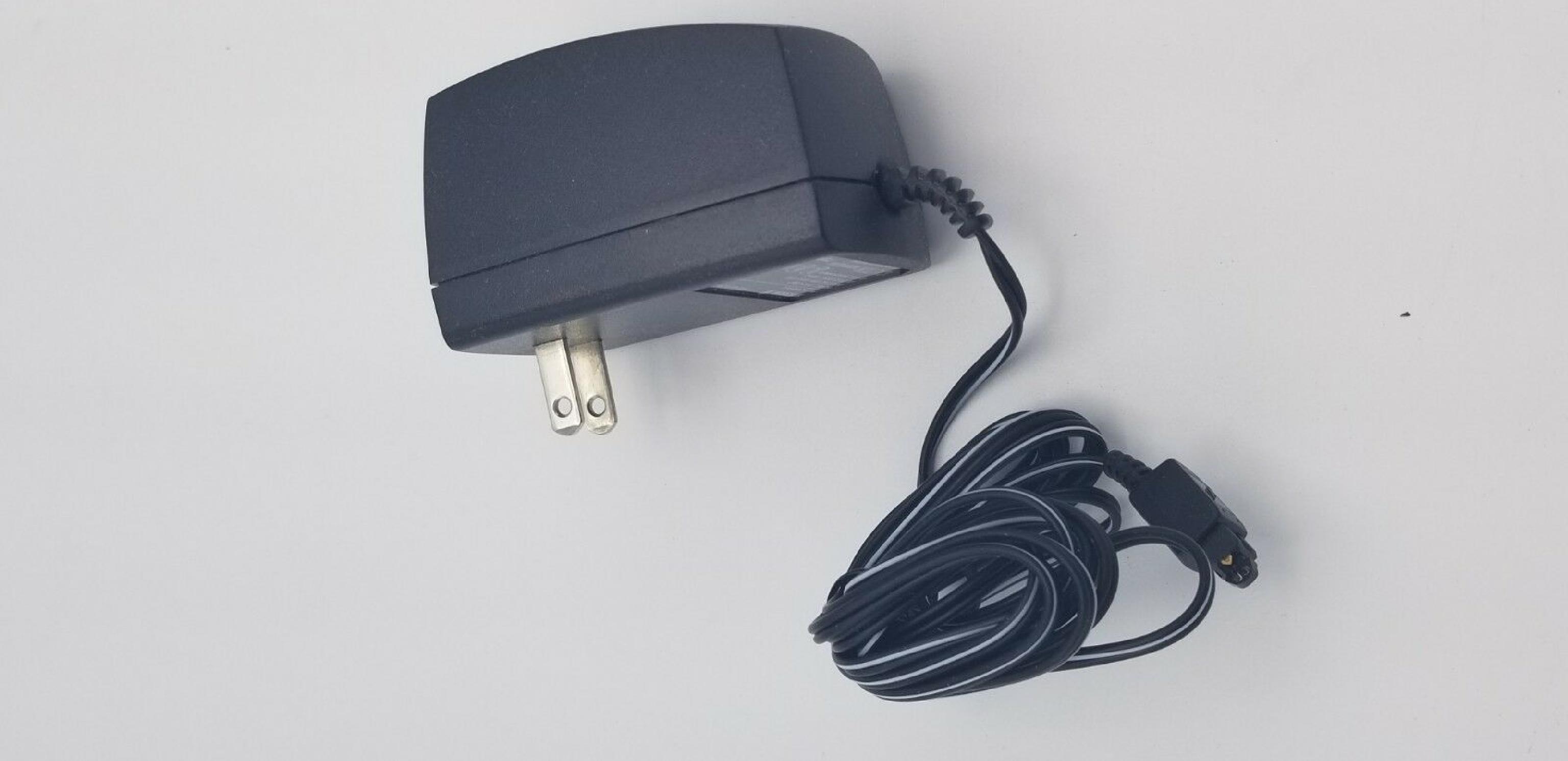 ERICSSON PI-41-356D AC ADAPTER 6V DC 700MA FOR USE WITH KH668