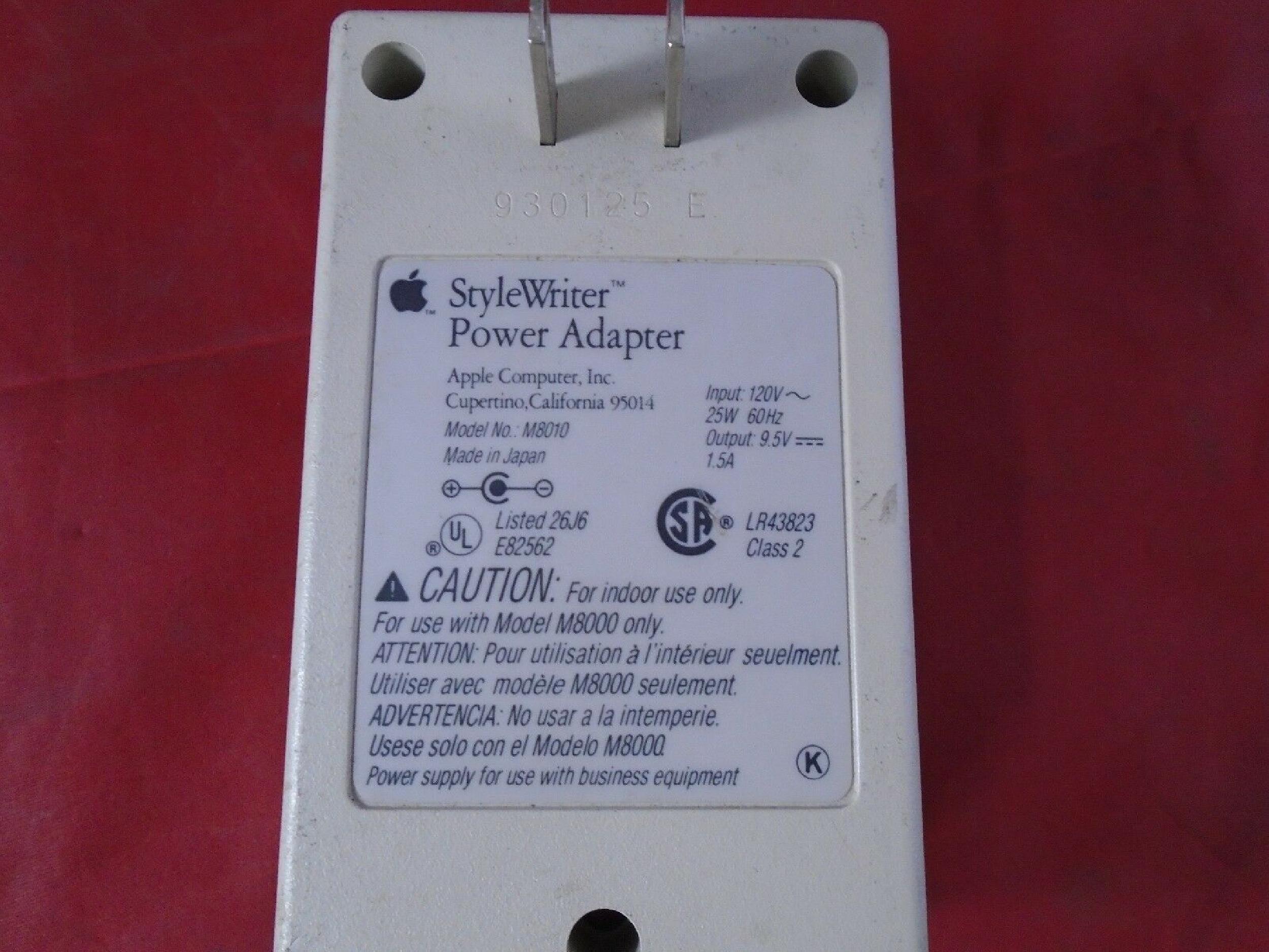 APPLE M8010 AC ADAPTER STYLEWRITER 9.5VDC 1.5A, 6FT CABLE WITH BARREL CONNECTOR, OD:5.5MM, ID:2.15MM, WALL STYLE, NEGATIVE INSIDE POLE