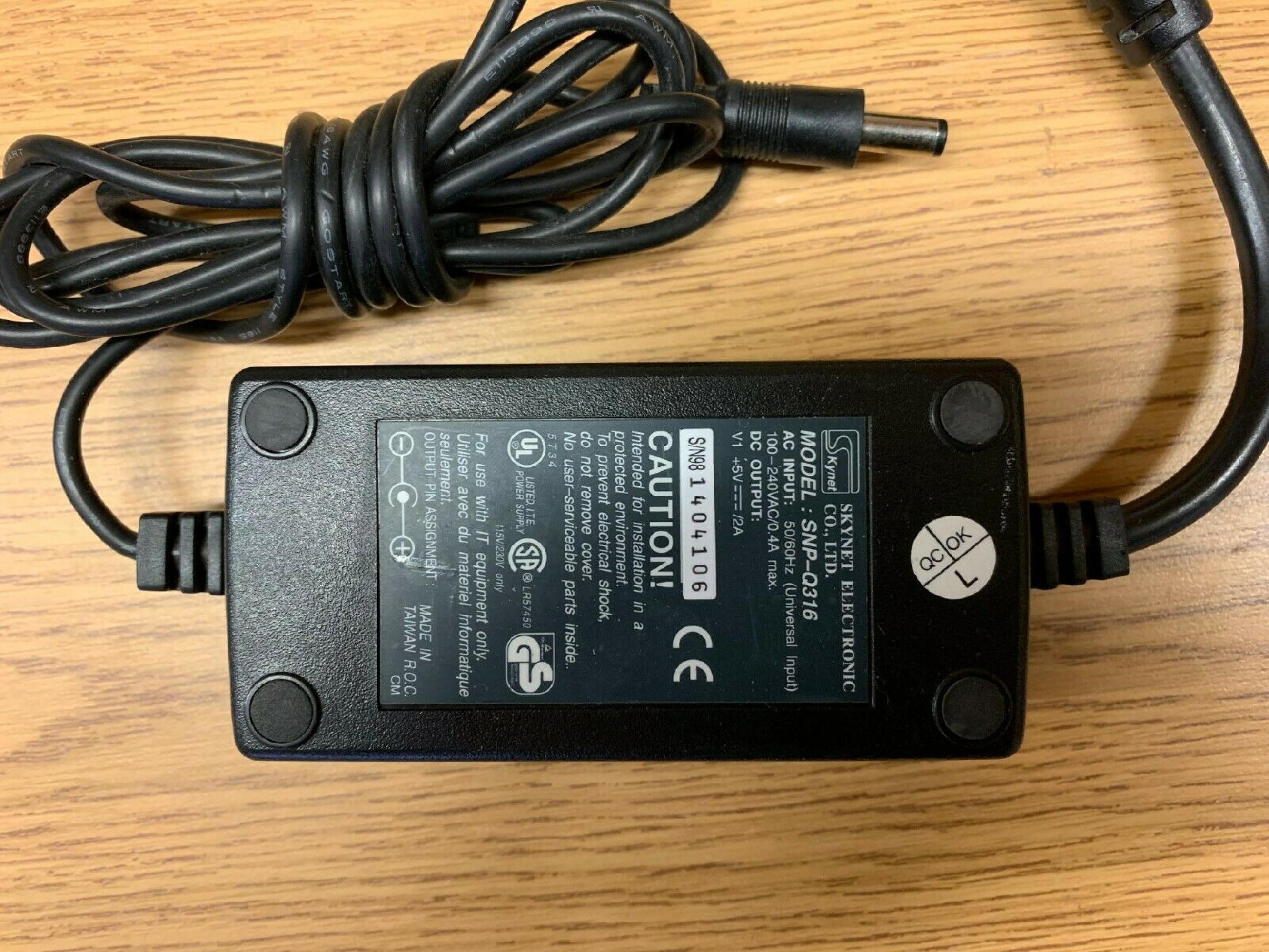 SKYNET ELECTRONICS SNP-Q316 AC ADAPTER 5VDC 2A, 6FT CABLE WITH BARREL CONNECTOR, DESKTOP STYLE, NEGATIVE OUTSIDE POLE