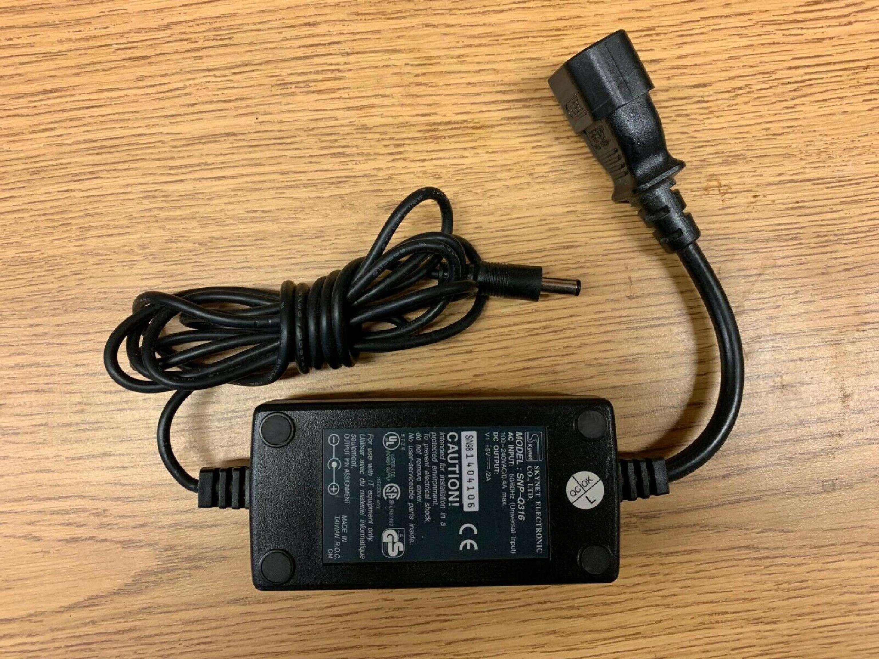 SKYNET ELECTRONICS SNP-Q316 AC ADAPTER 5VDC 2A, 6FT CABLE WITH BARREL CONNECTOR, DESKTOP STYLE, NEGATIVE OUTSIDE POLE