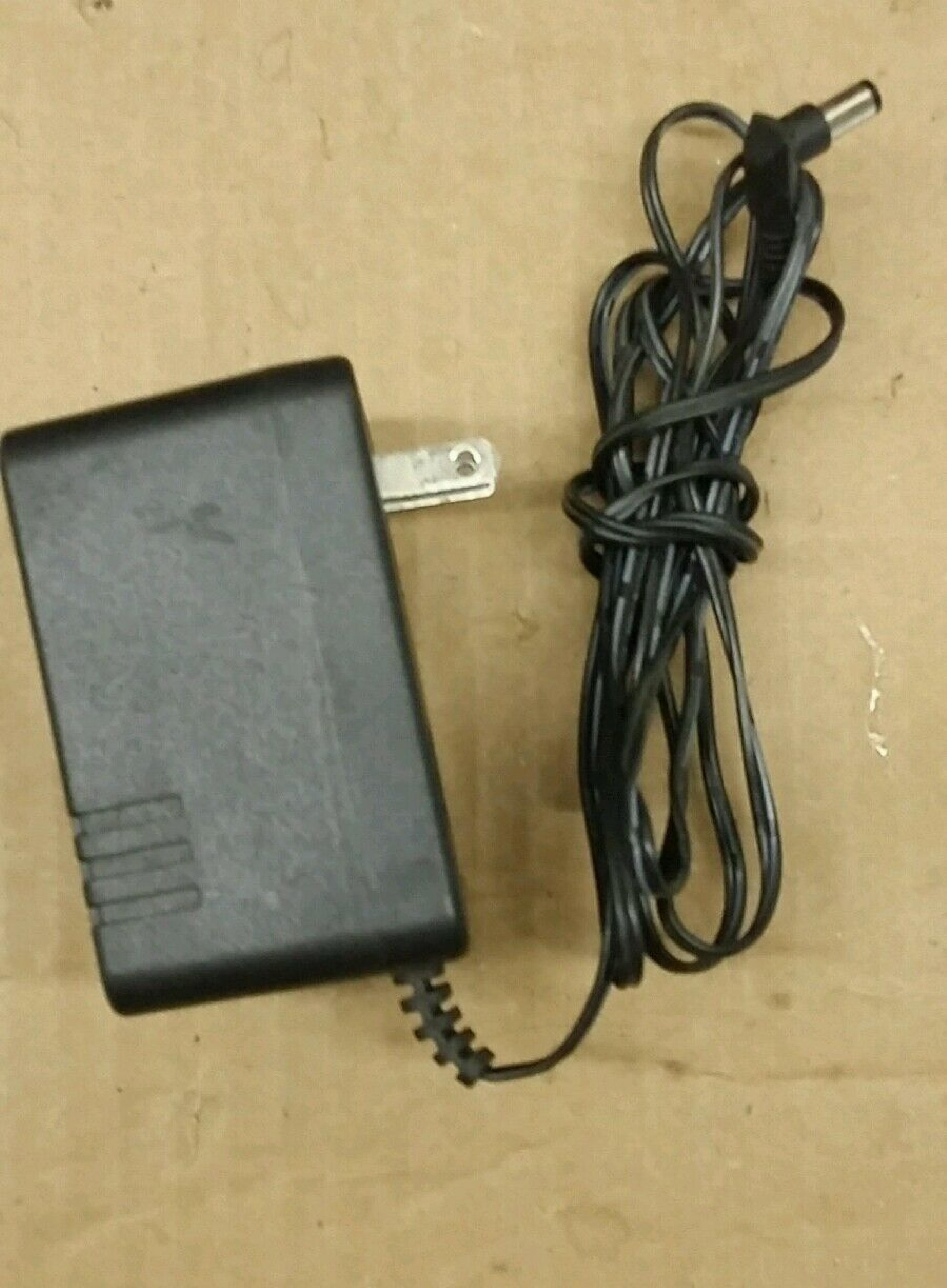 LINKSYS MW48-1201000 AC ADAPTER 12VDC 1A, 6FT CABLE WITH BARREL CONNECTOR, OD:5.5MM, ID:2.0MM, WALL STYLE, NEGATIVE OUTSIDE POLE