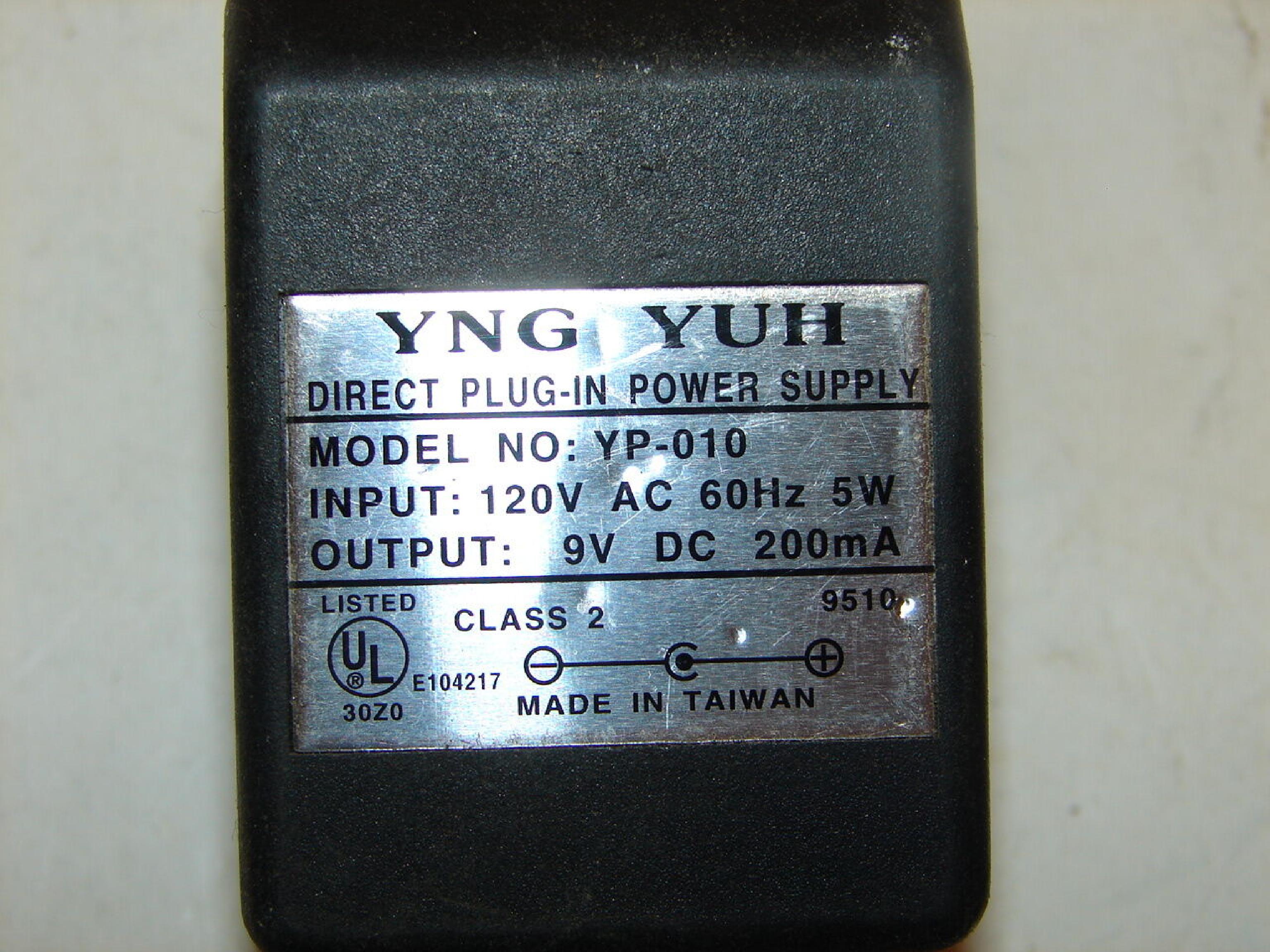 YNG YUH YP-010 AC ADAPTER 9VDC 200MA, 6FT CABLE WITH BARREL CONNECTOR, OD:5.5MM, ID:2.0MM, WALL STYLE, NEGATIVE OUTSIDE POLE