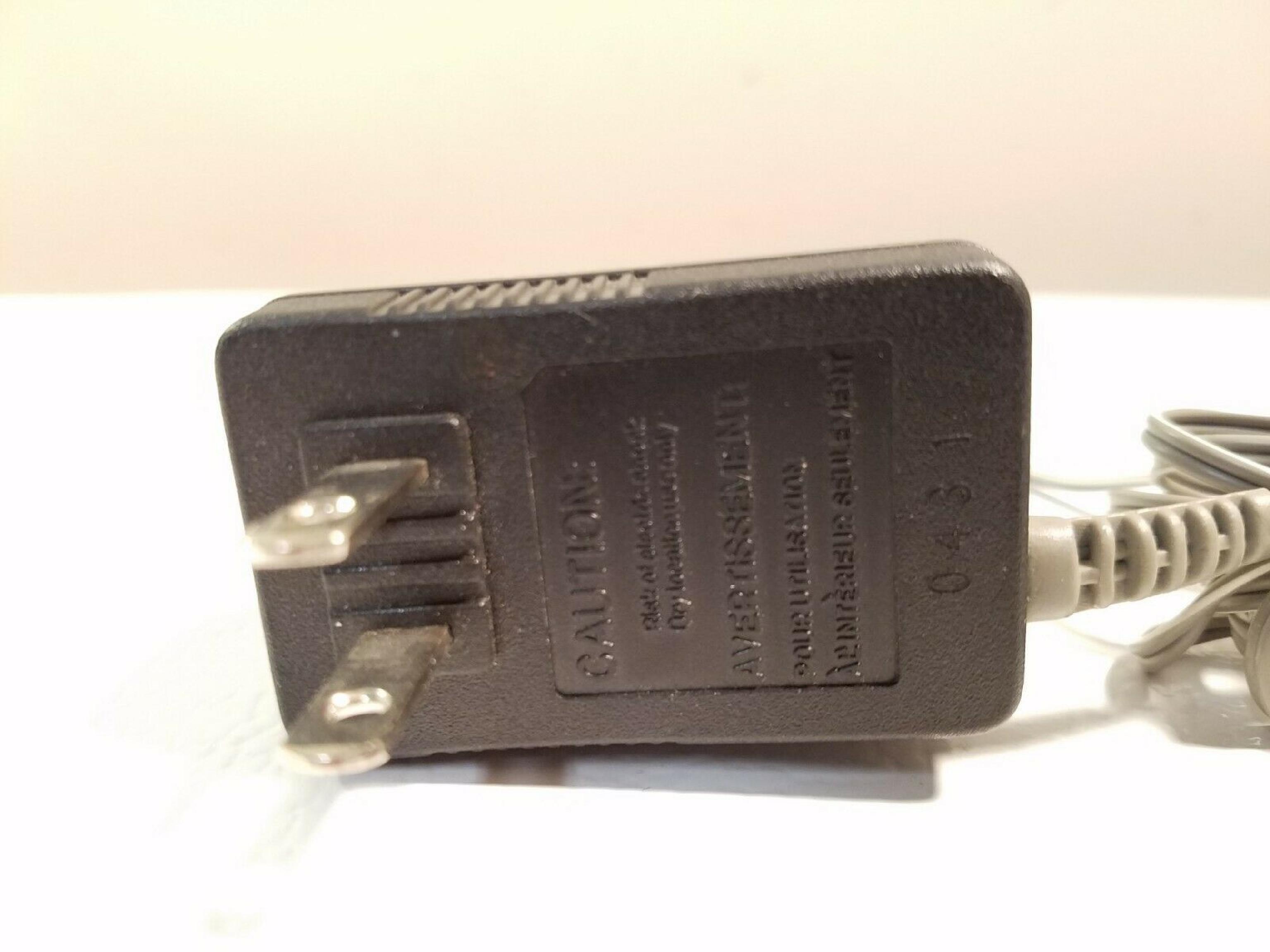 PANASONIC PQWATC1461M1 AC ADAPTER 9VDC 200MA, 6FT CABLE WITH BARREL CONNECTOR, OD:5.5MM, ID:2.15MM, WALL STYLE, NEGATIVE INSIDE POLE