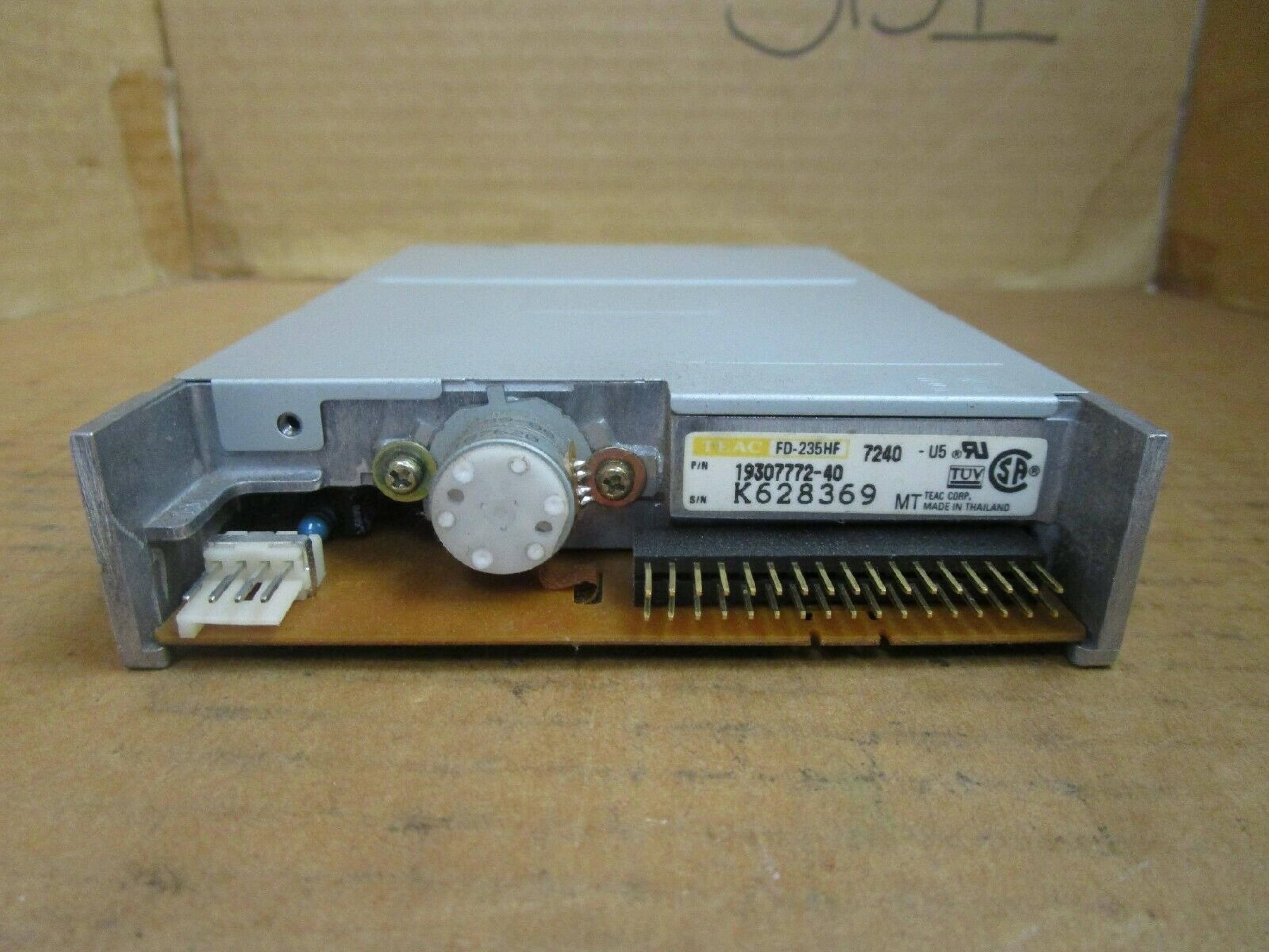 TEAC 19307772-40 FLOPPY DRIVE WITH TAN BEZEL 1.44MB BLACK