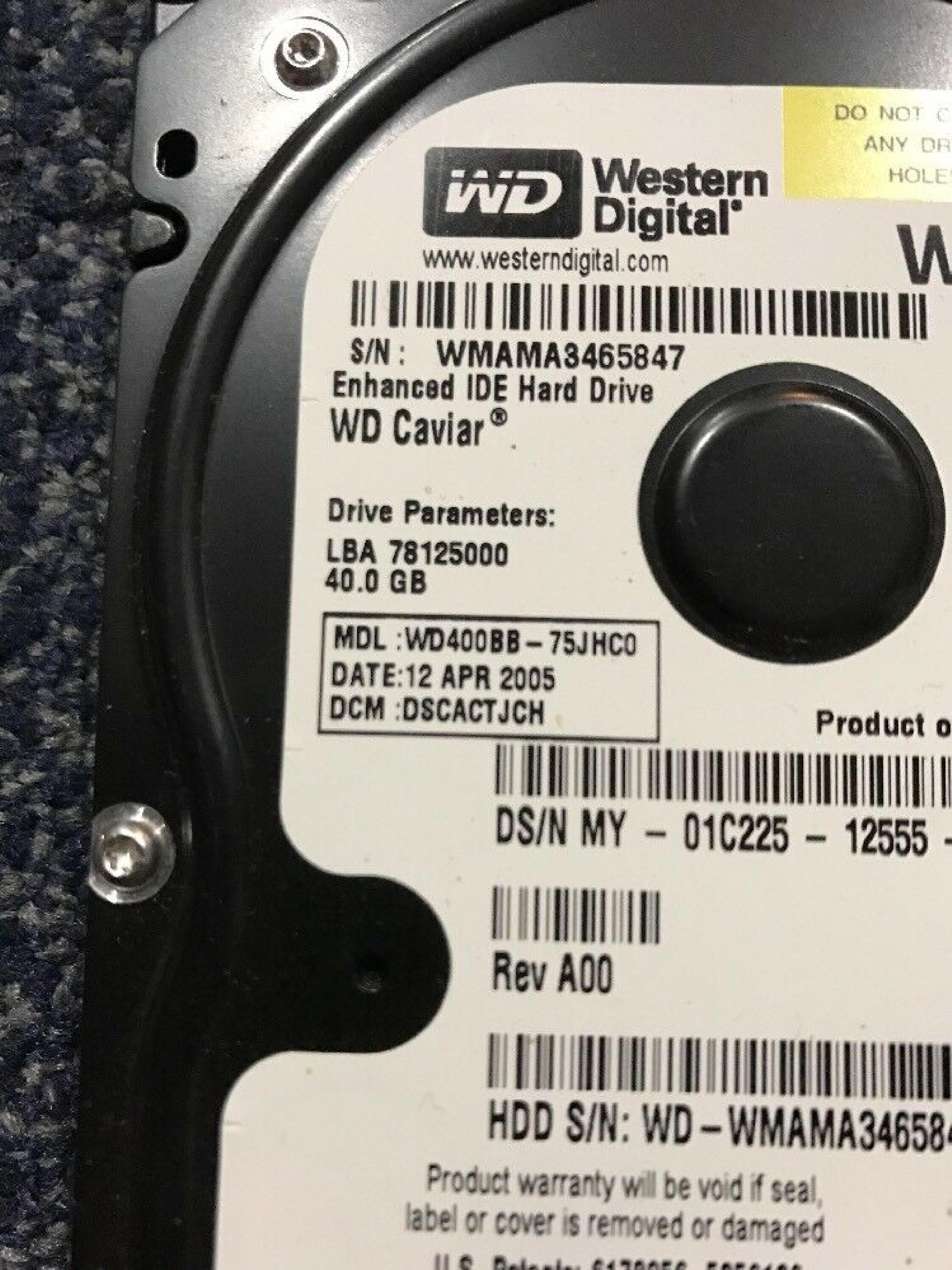 WESTERN DIGITAL / WD WD400BB-75JHC0 40GB IDE HD LBA 78165360 DATE 09 NOV 2005 DCM ESBACTJCA 78125000 22 DEC HSBHNTJCA REV A00 CAVIAR 10 MAR 2006 HSBHCTJCH 25 AUG HSCHNTJAH