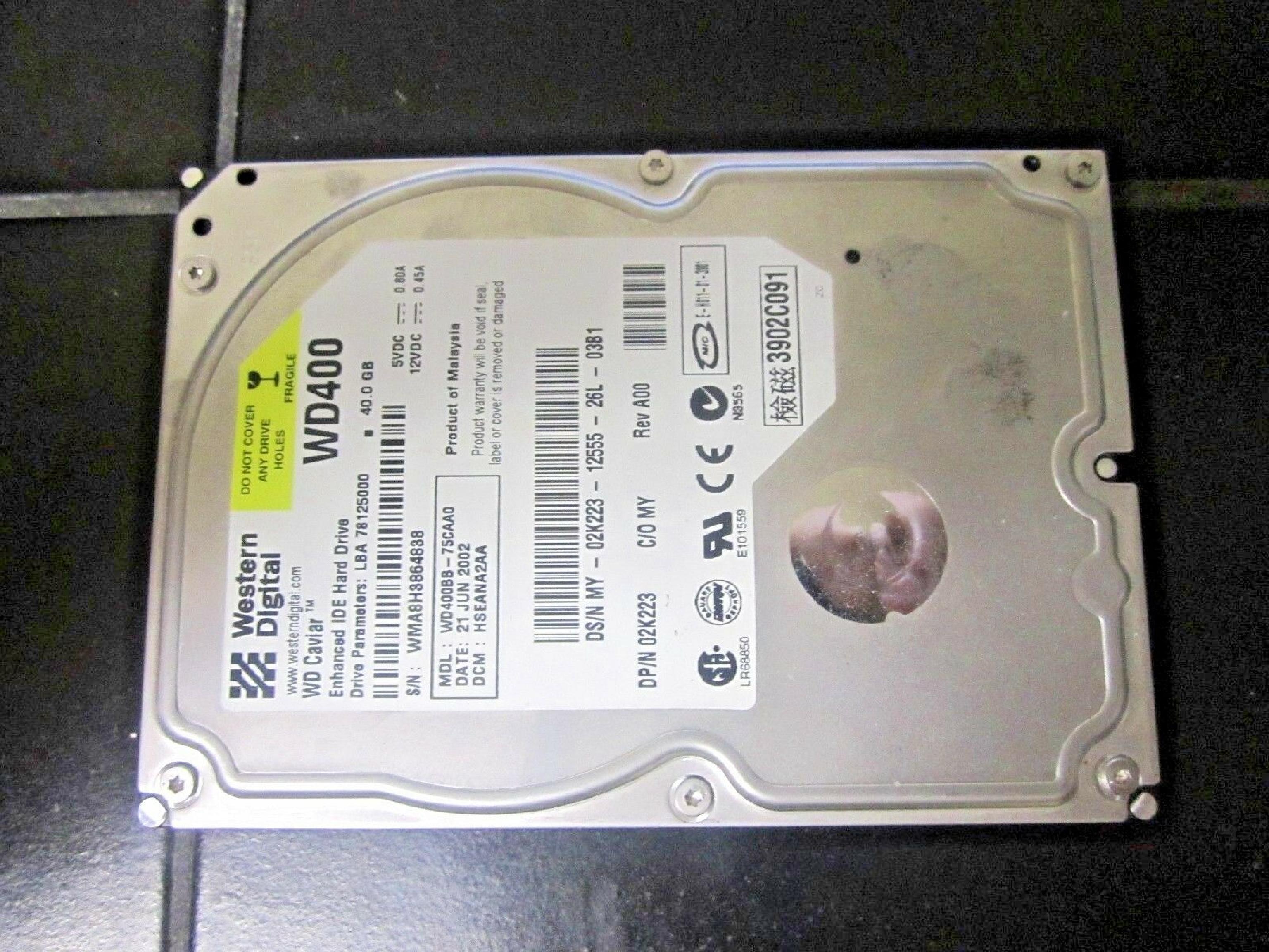 WESTERN DIGITAL / WD WD400BB-75CAA0 40GB IDE HD LBA 78165360 DATE 03 MAR 2002 DCM DSEANA2CH 04 DSFANA2CA REV A00 CAVIAR DRIVE 78125000 HSEHNA2CH 20GB 15 FEB