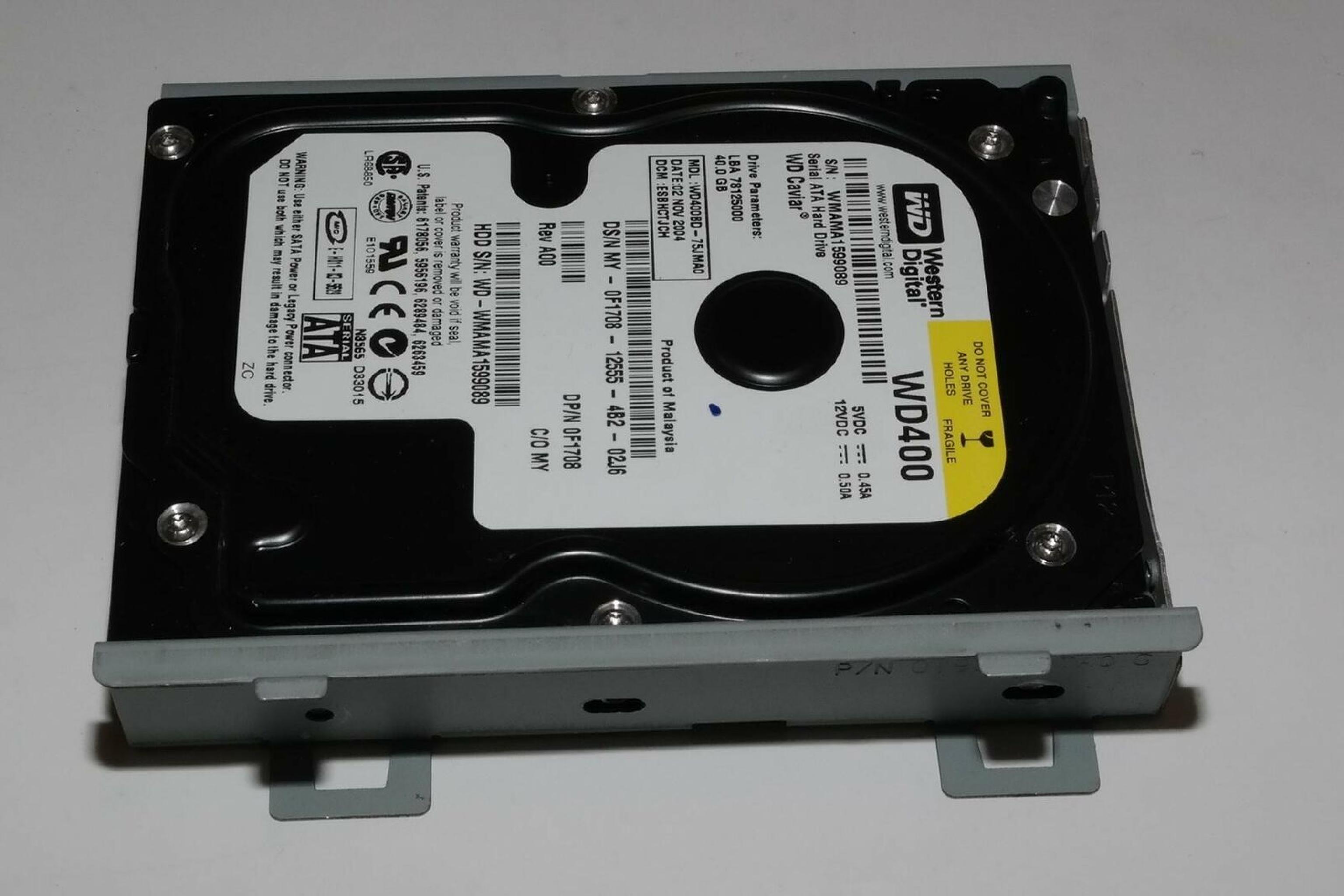 WESTERN DIGITAL / WD WD400BD 40GB SATA HD DATE 24 JUL 2006 DCM HSCACTJCA REV A00 CAVIAR 29 NOV HSBANTJCH 05 SEP 27 MAR 2007 ESBHYTJEH 13 ESBHCTJCH 28 HSBHNTJCH ESBACTJCA ESCACTJCH