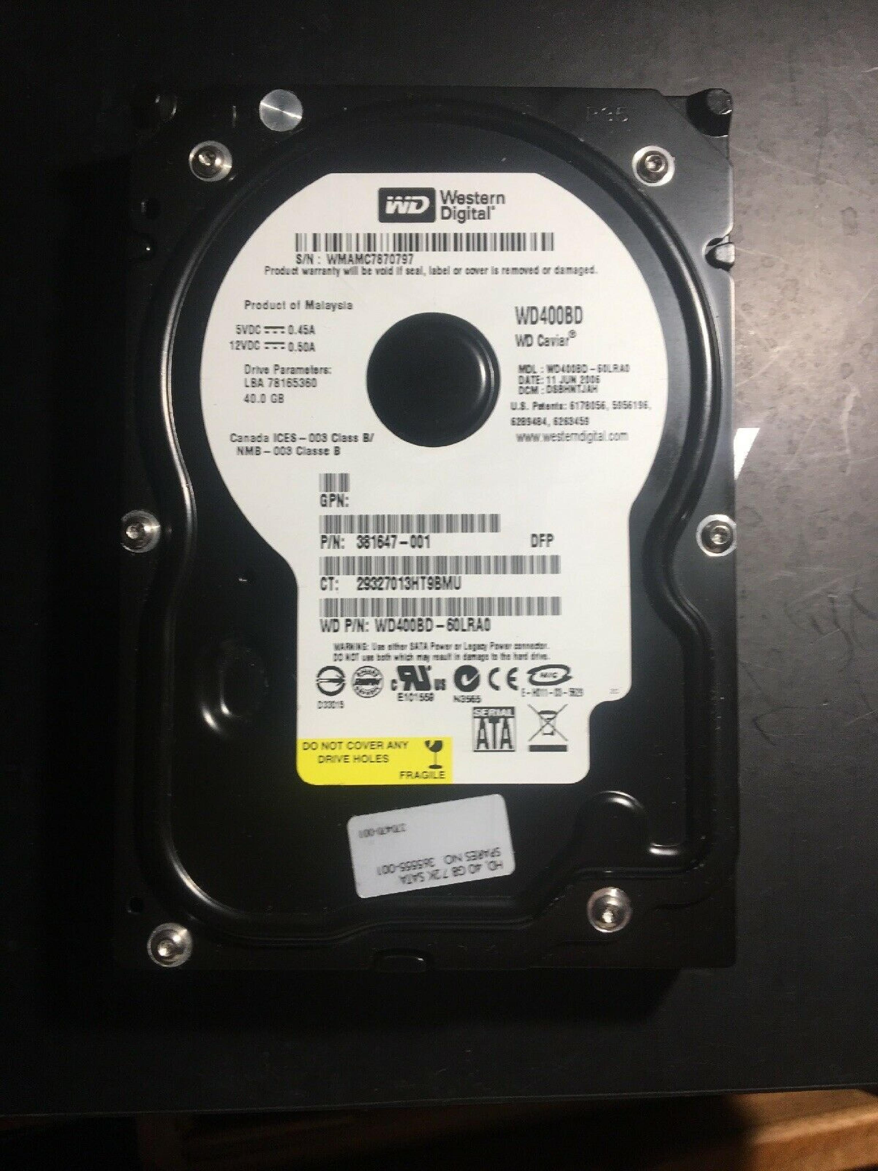 WESTERN DIGITAL / WD WD400BD 40GB SATA HD DATE 24 JUL 2006 DCM HSCACTJCA REV A00 CAVIAR 29 NOV HSBANTJCH 05 SEP 27 MAR 2007 ESBHYTJEH 13 ESBHCTJCH 28 HSBHNTJCH ESBACTJCA ESCACTJCH