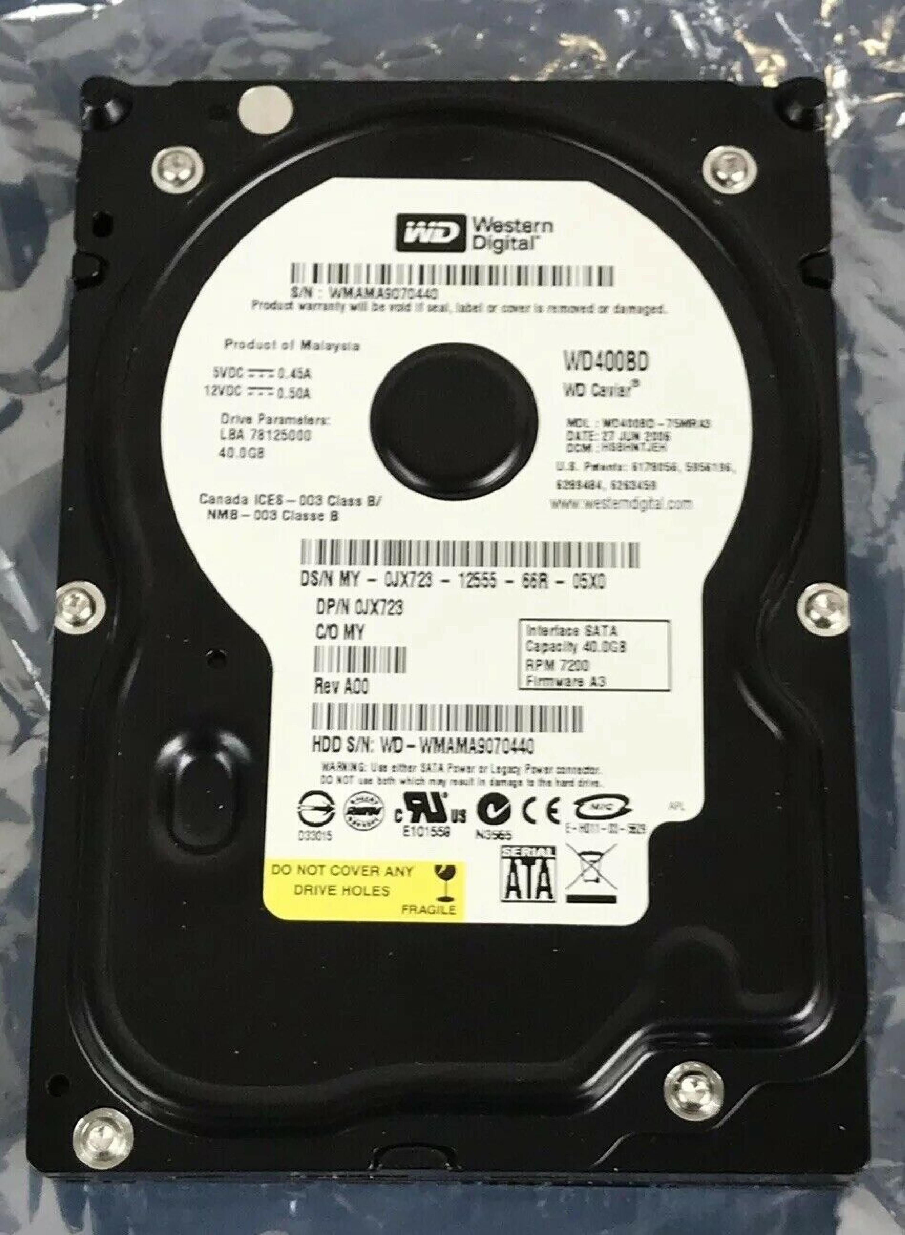 WESTERN DIGITAL / WD WD400BD-75MRA3 40GB SATA HD DATE 24 JUL 2006 DCM HSCACTJCA REV A00 CAVIAR 29 NOV HSBANTJCH 05 SEP 27 MAR 2007 ESBHYTJEH 13 ESBHCTJCH 28 HSBHNTJCH ESBACTJCA ESCACTJCH