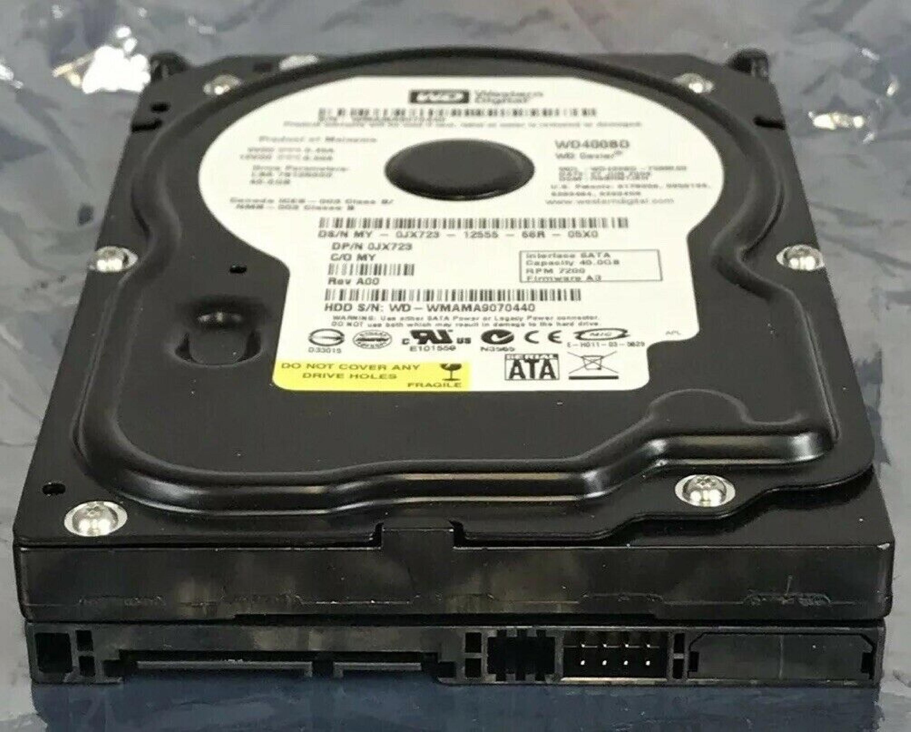 WESTERN DIGITAL / WD WD400BD-75MRA3 40GB SATA HD DATE 24 JUL 2006 DCM HSCACTJCA REV A00 CAVIAR 29 NOV HSBANTJCH 05 SEP 27 MAR 2007 ESBHYTJEH 13 ESBHCTJCH 28 HSBHNTJCH ESBACTJCA ESCACTJCH