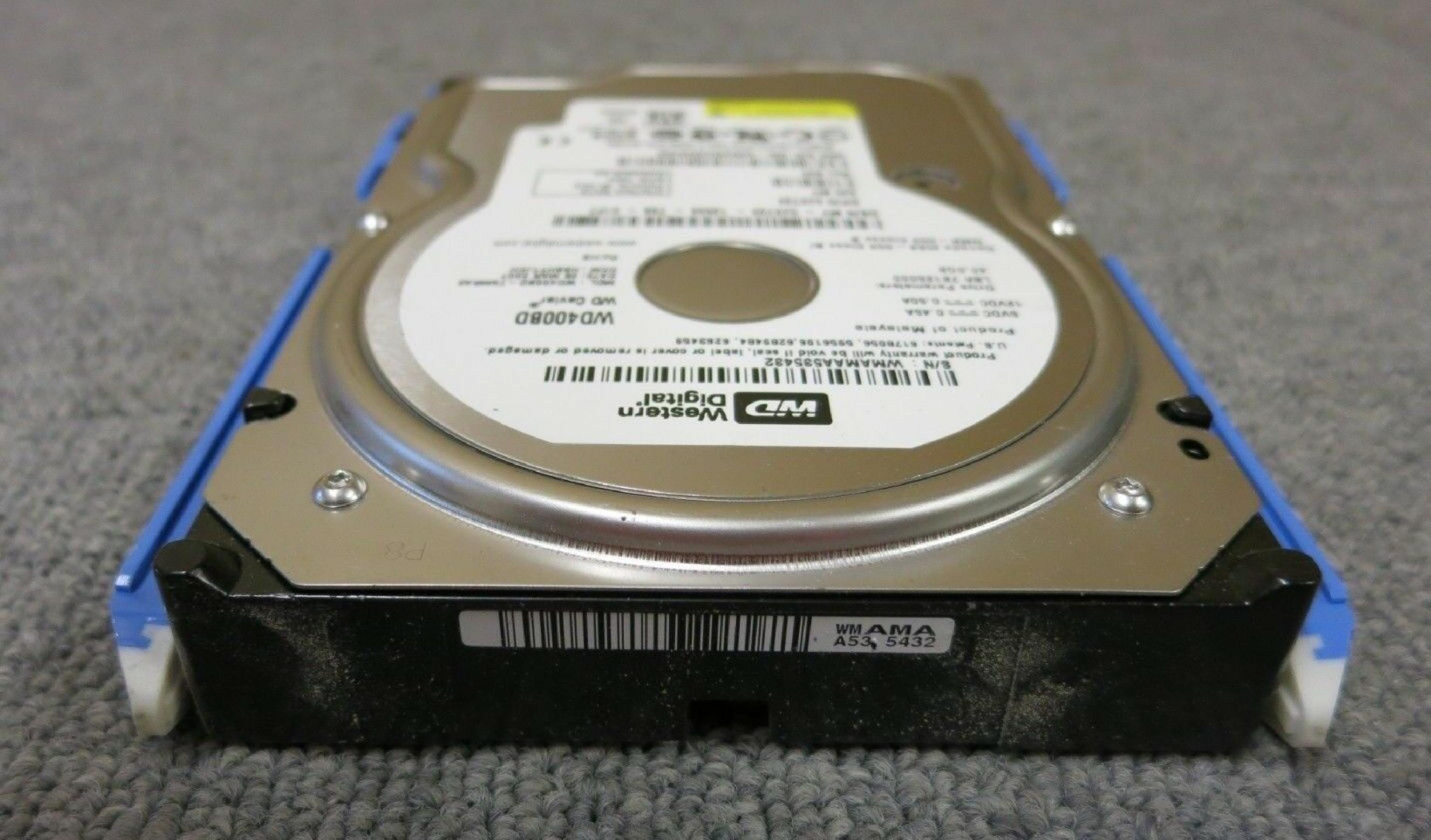 WESTERN DIGITAL / WD 0JX723 40GB SATA HD DATE 24 JUL 2006 DCM HSCACTJCA REV A00 CAVIAR 29 NOV HSBANTJCH 05 SEP 27 MAR 2007 ESBHYTJEH 13 ESBHCTJCH 28 HSBHNTJCH ESBACTJCA ESCACTJCH