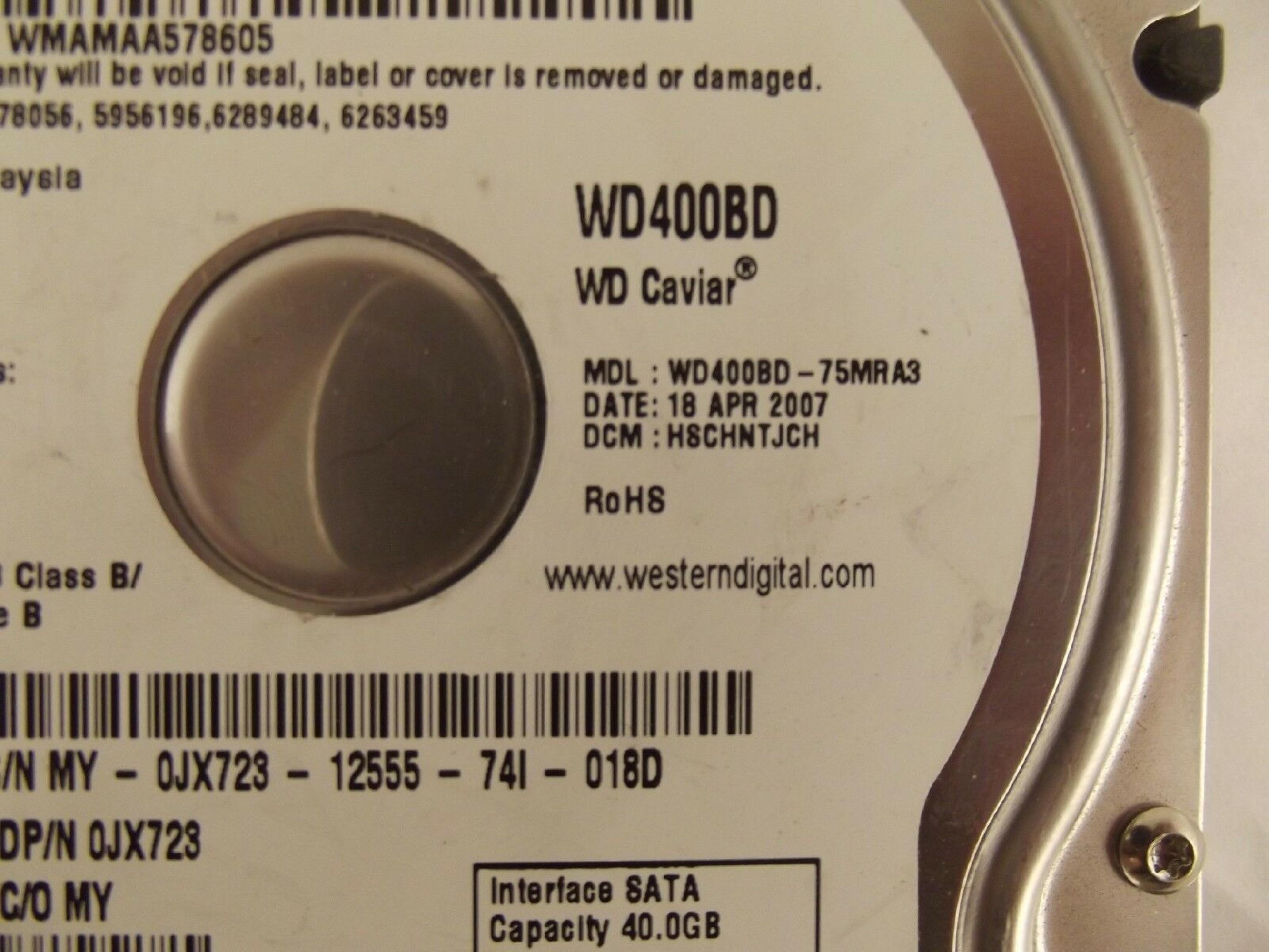 WESTERN DIGITAL / WD 0JX723 40GB SATA HD DATE 24 JUL 2006 DCM HSCACTJCA REV A00 CAVIAR 29 NOV HSBANTJCH 05 SEP 27 MAR 2007 ESBHYTJEH 13 ESBHCTJCH 28 HSBHNTJCH ESBACTJCA ESCACTJCH