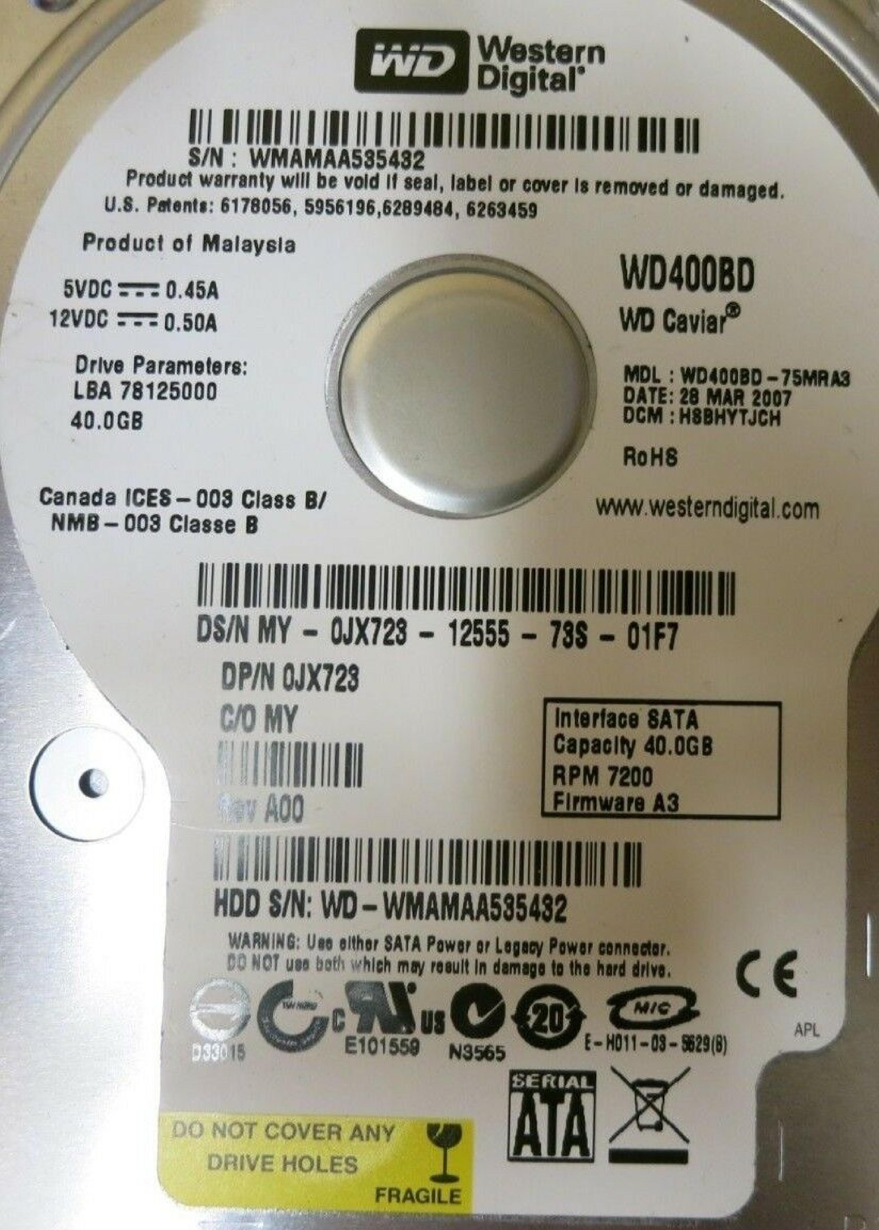 WESTERN DIGITAL / WD 0JX723 40GB SATA HD DATE 24 JUL 2006 DCM HSCACTJCA REV A00 CAVIAR 29 NOV HSBANTJCH 05 SEP 27 MAR 2007 ESBHYTJEH 13 ESBHCTJCH 28 HSBHNTJCH ESBACTJCA ESCACTJCH