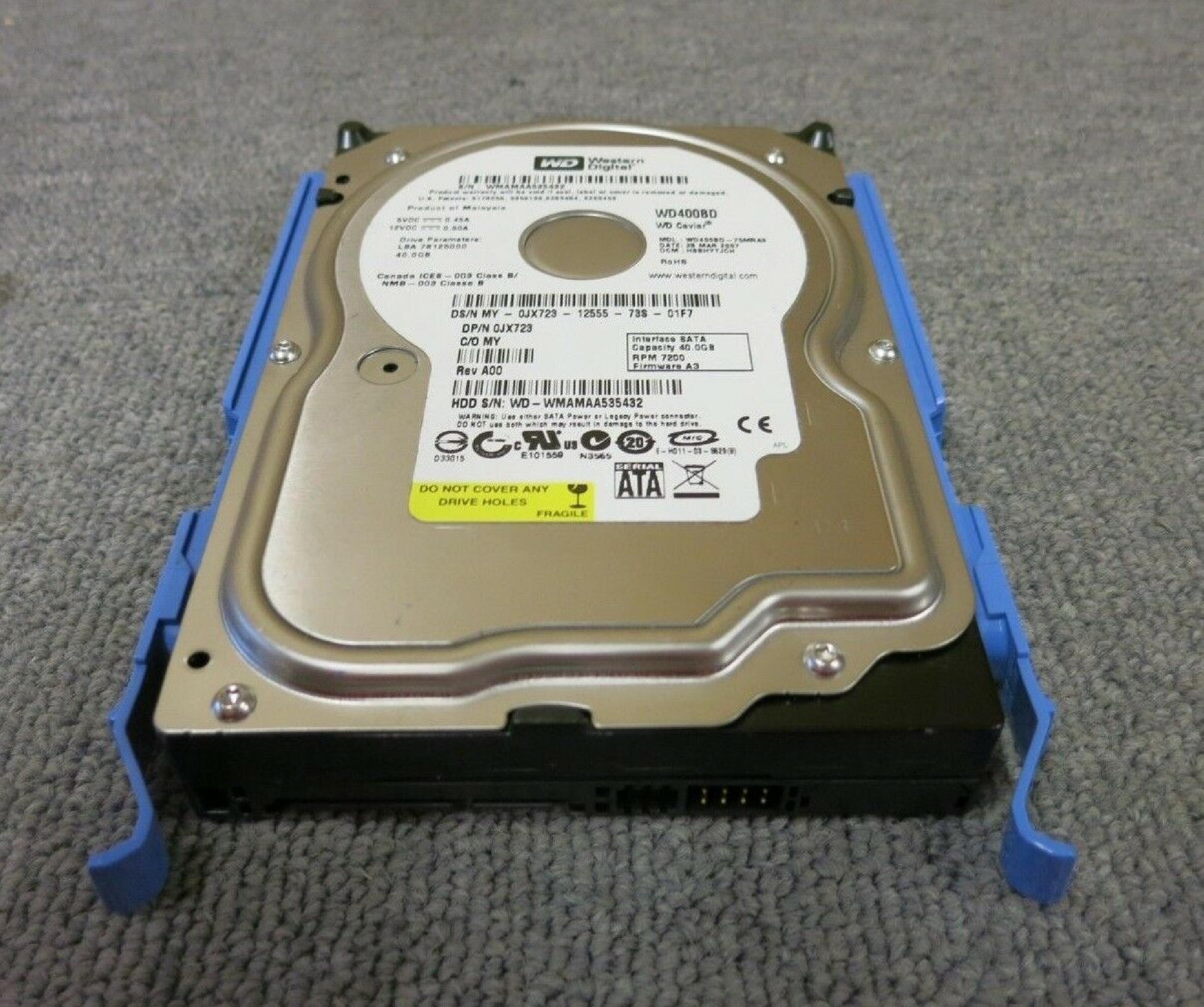 WESTERN DIGITAL / WD 0JX723 40GB SATA HD DATE 24 JUL 2006 DCM HSCACTJCA REV A00 CAVIAR 29 NOV HSBANTJCH 05 SEP 27 MAR 2007 ESBHYTJEH 13 ESBHCTJCH 28 HSBHNTJCH ESBACTJCA ESCACTJCH