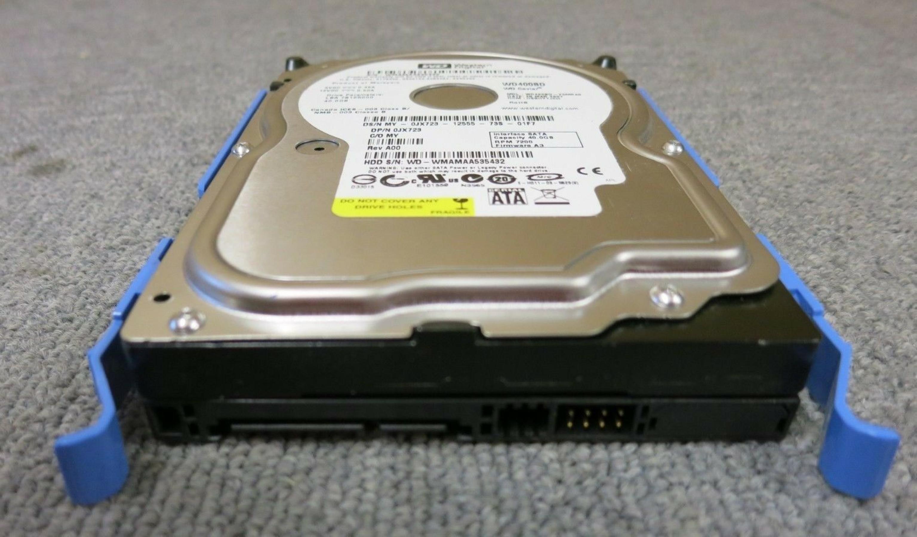 WESTERN DIGITAL / WD 0JX723 40GB SATA HD DATE 24 JUL 2006 DCM HSCACTJCA REV A00 CAVIAR 29 NOV HSBANTJCH 05 SEP 27 MAR 2007 ESBHYTJEH 13 ESBHCTJCH 28 HSBHNTJCH ESBACTJCA ESCACTJCH