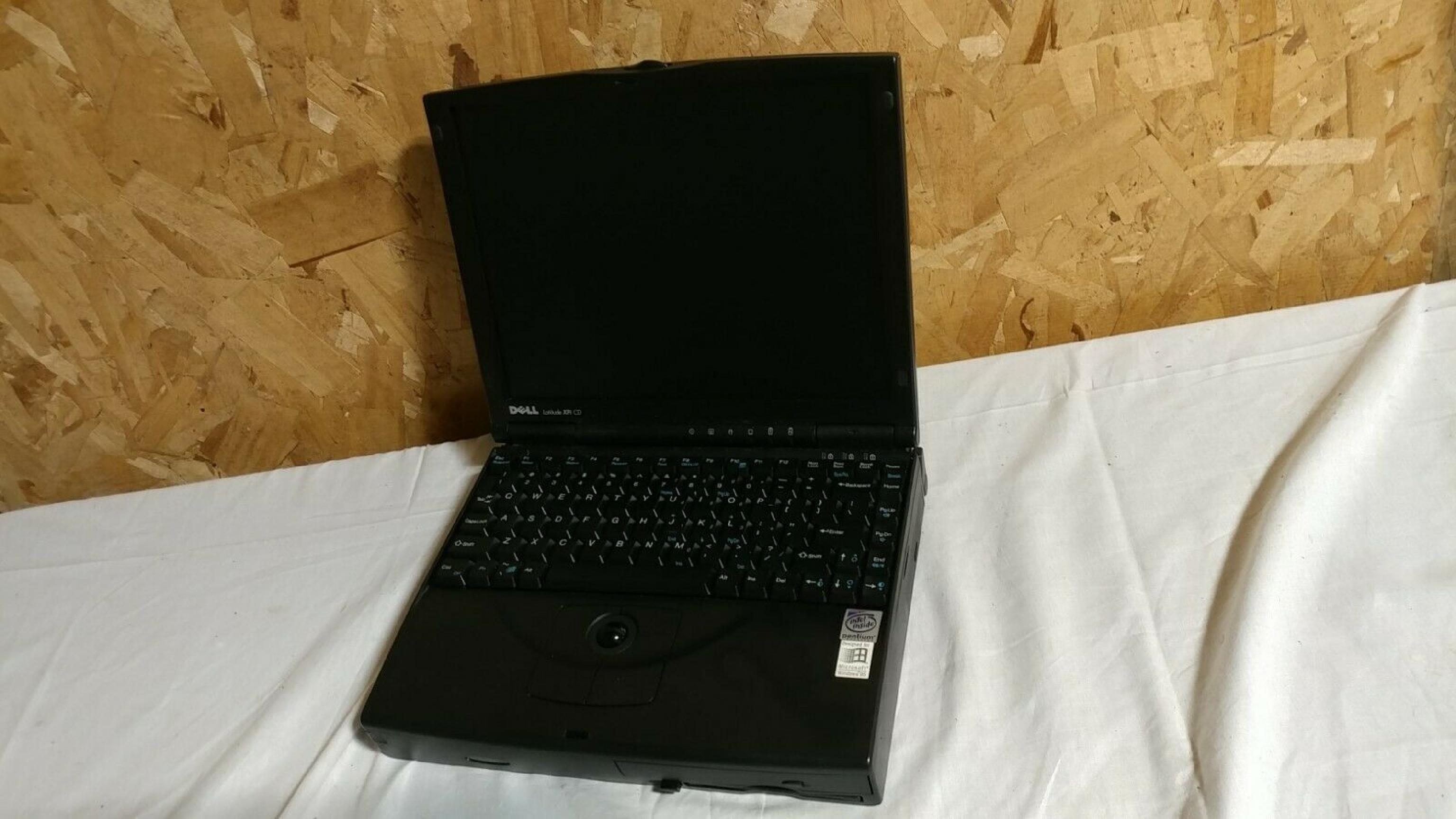 DELL PPS BATTERY DEFUNCT, NOTEBOOK COMPUTER, LATITUDE XPI CD, 150MHZ PENTIUM, 48MB RAM, 1.02GB HARD DRIVE, BOOTS TO WIN98