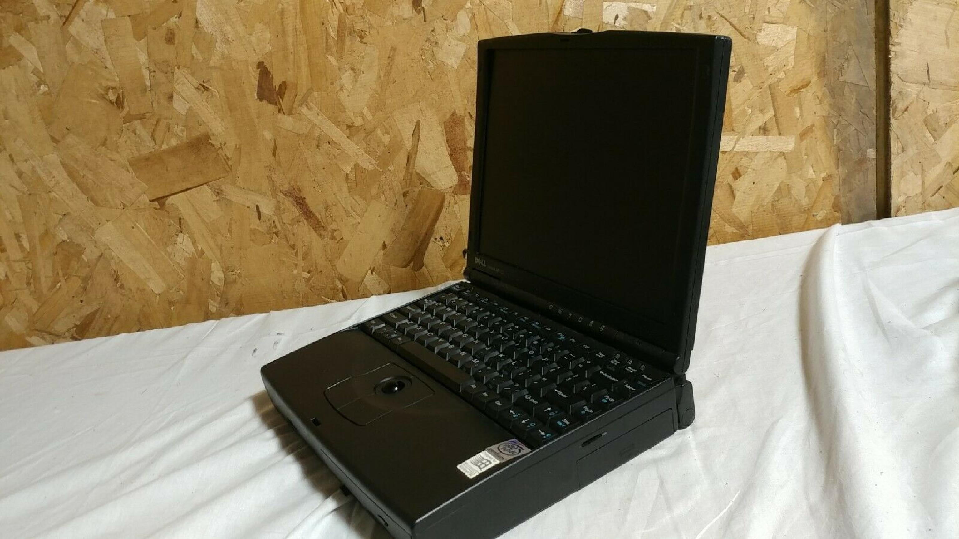 DELL PPS BATTERY DEFUNCT, NOTEBOOK COMPUTER, LATITUDE XPI CD, 150MHZ PENTIUM, 48MB RAM, 1.02GB HARD DRIVE, BOOTS TO WIN98