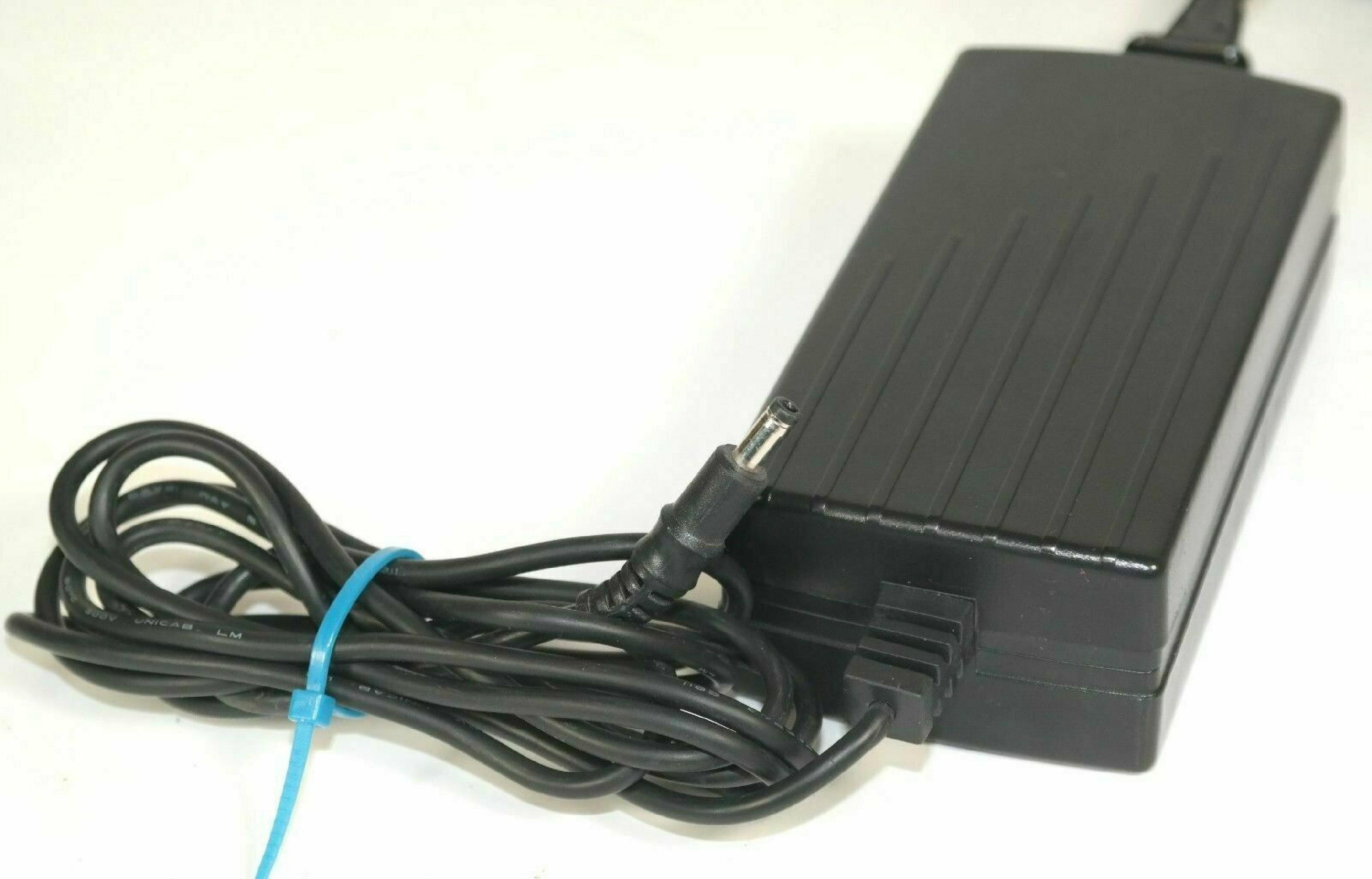 SYMBOL 50-14000-101 AC ADAPTER 9V 1A OD:4MM ID:1.8MM BARREL CONNECTOR POSITIVE TIP