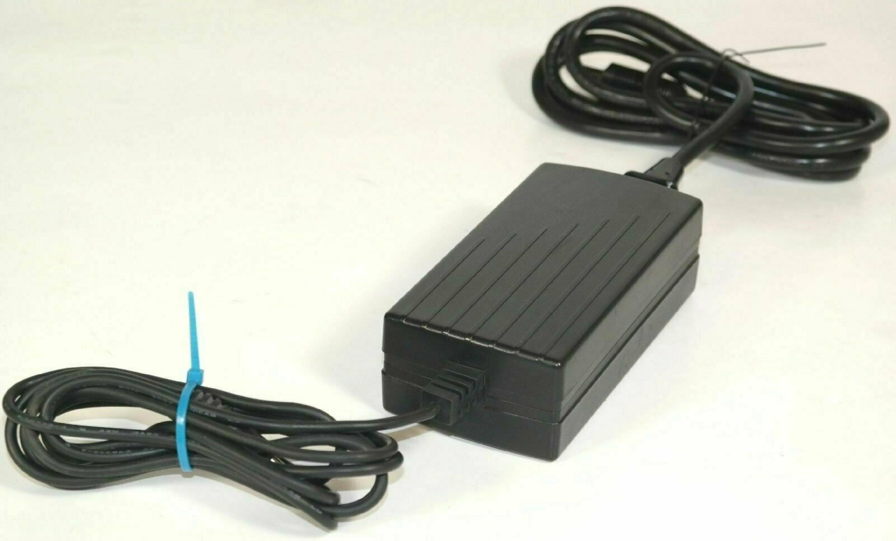 SYMBOL 50-14000-101 AC ADAPTER 9V 1A OD:4MM ID:1.8MM BARREL CONNECTOR POSITIVE TIP