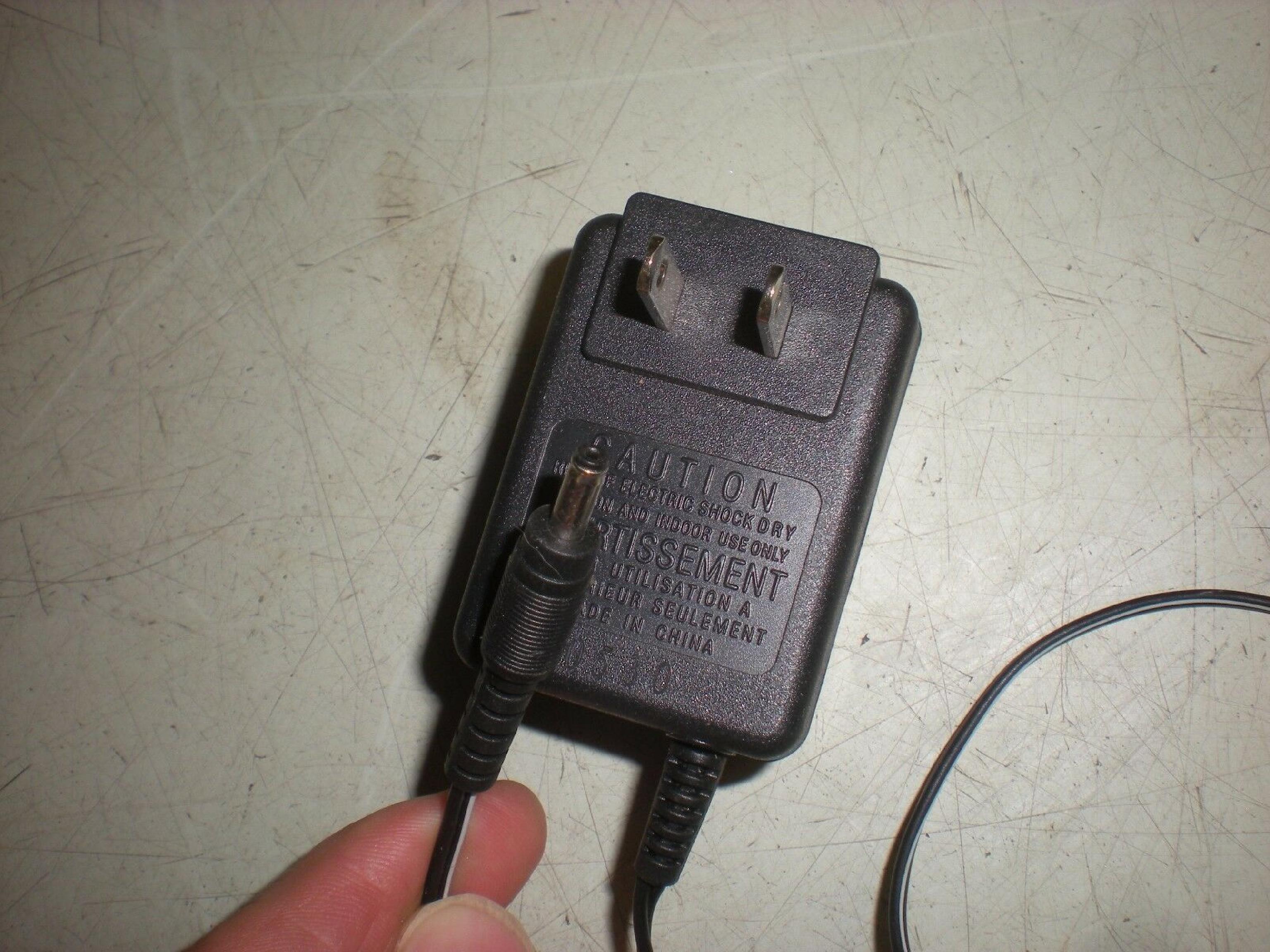 PLANTRONICS 65158-01 AC ADAPTER 9VDC 300MA POSITIVE CENTER, BARREL CONNECTOR, OD:4MM ID:1MM