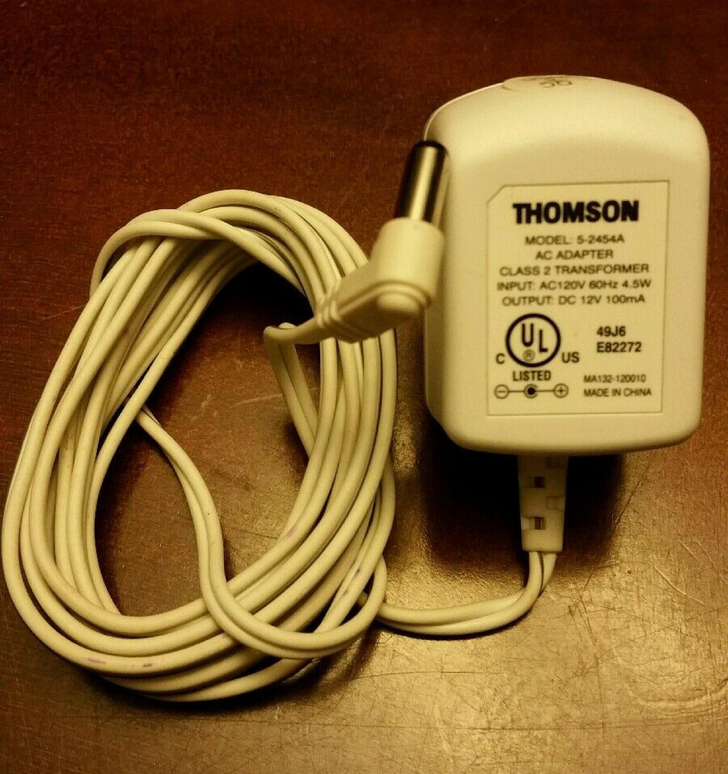 THOMSON 5-2454A AC ADAPTER 12V DC 100MA POSITIVE TIP BARREL CONNECTOR OD:5.5MM ID:2.1MM