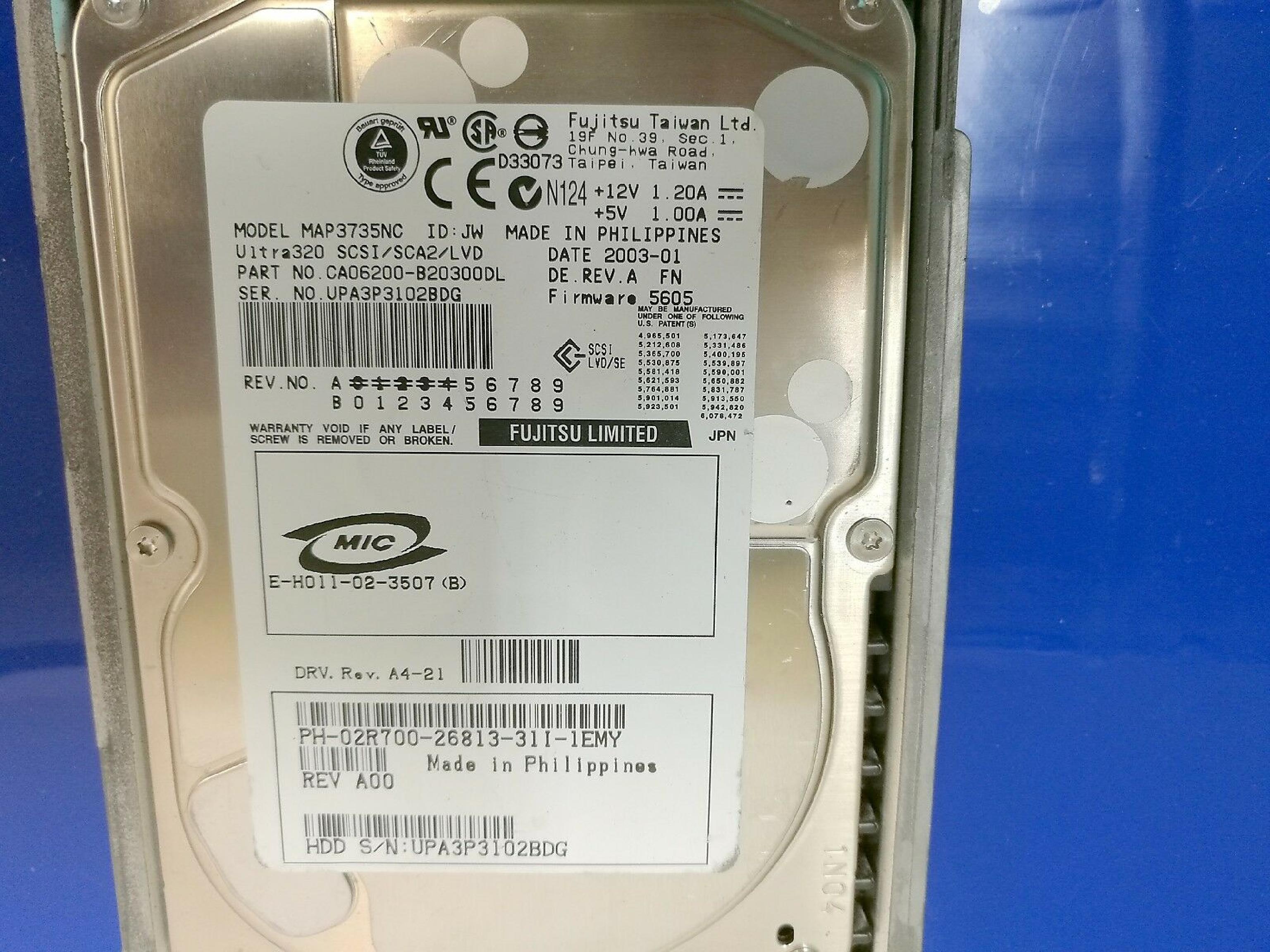 FUJITSU 2R700 73GB 3.5IN 10K RPM ULTRA 320 SCSI/SCA2/LVD/SE DATE: 2002-12 REV. A REV A4-20 A00 WIDE ULTRA320 SCSI LVD/SE ID: JW 2003-07 FIRMWARE: 5605 DRV. A5-21