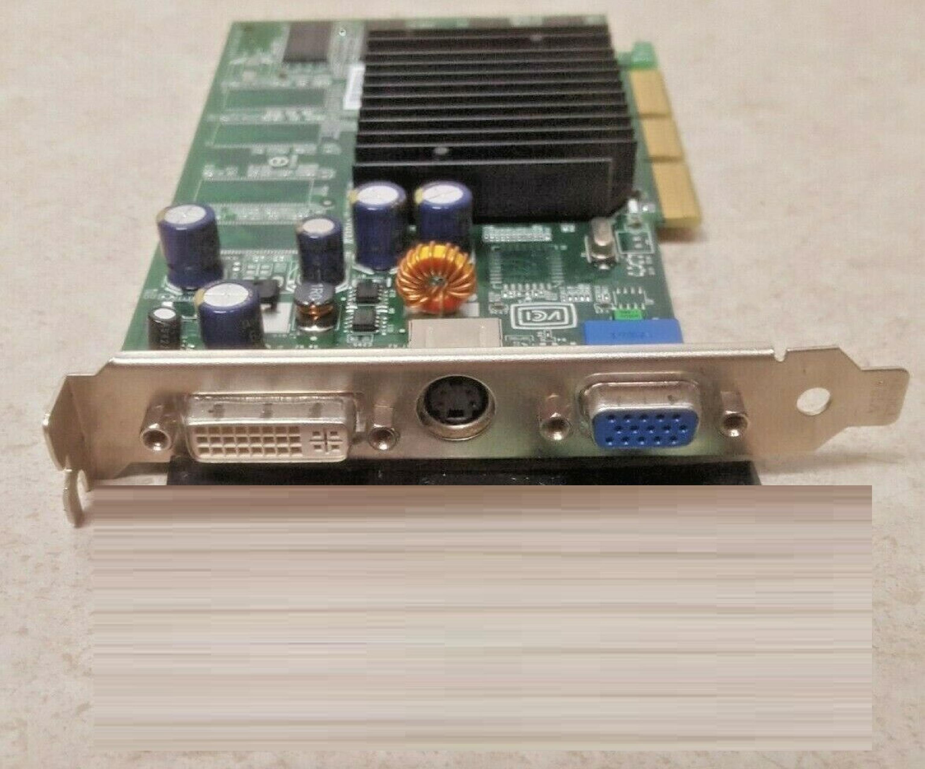 NVIDIA 8911 VER:330 128MB AGP VIDEO CARD WITH DVI VGA AND SVIDEO OUTPUTS 64MB
