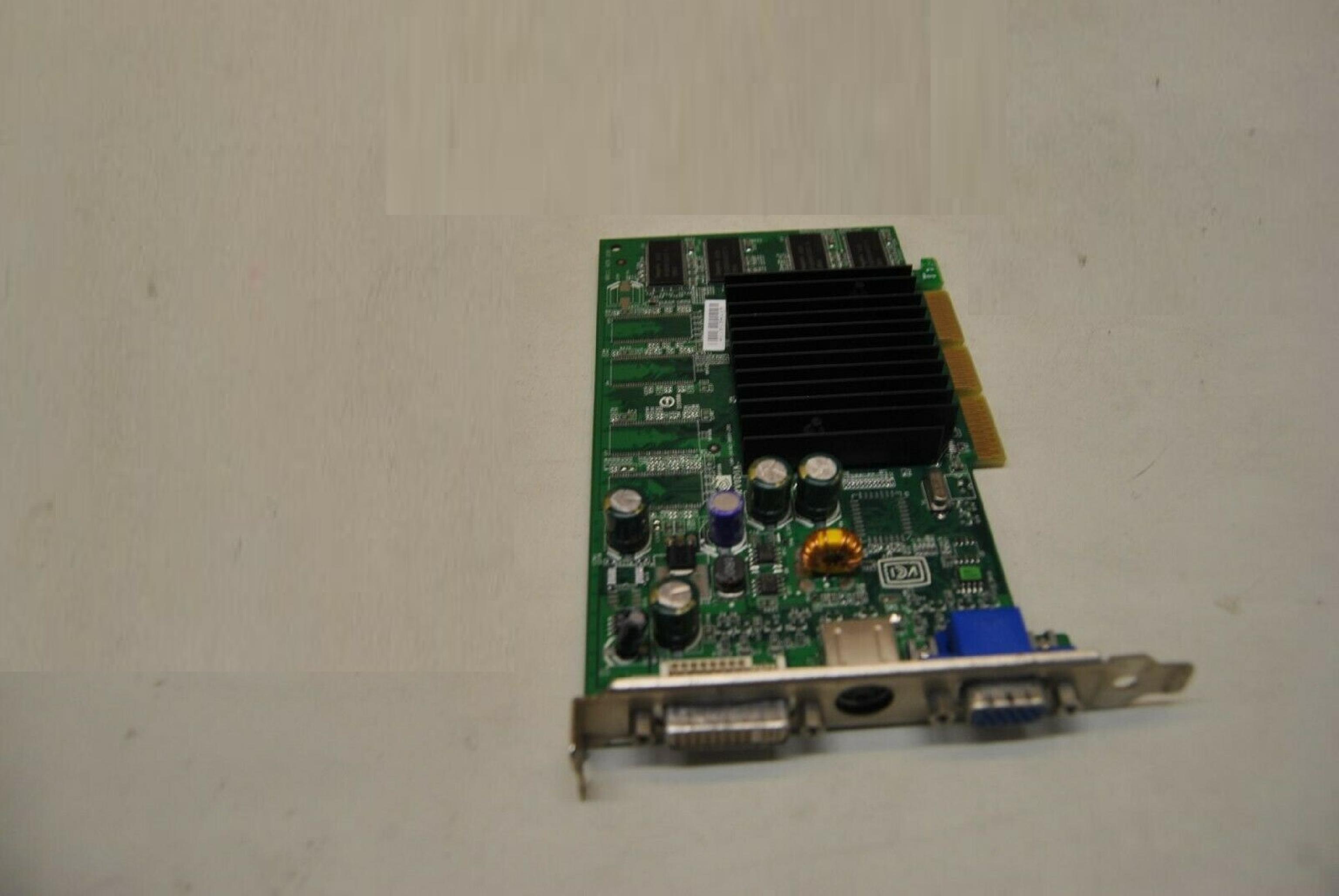 NVIDIA 8911 VER:330 128MB AGP VIDEO CARD WITH DVI VGA AND SVIDEO OUTPUTS 64MB
